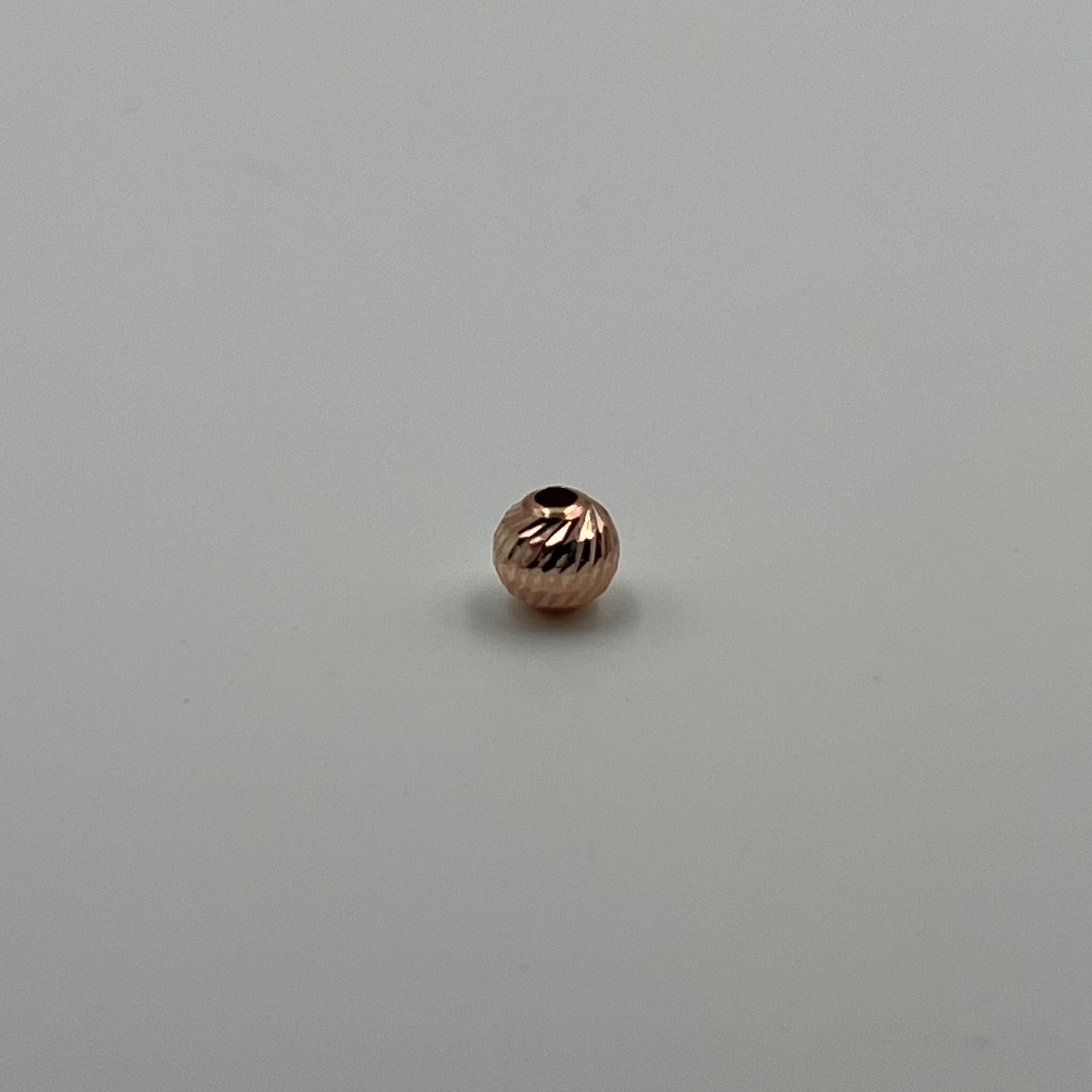 BOLA DIAMANTADA 6MM / NAC ORO ROSA