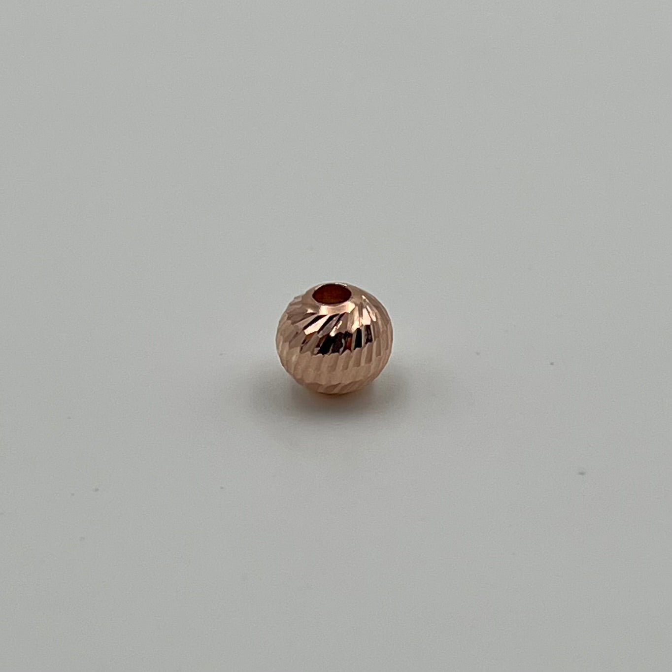 BOLA DIAMANTADA 8MM / NAC ORO ROSA