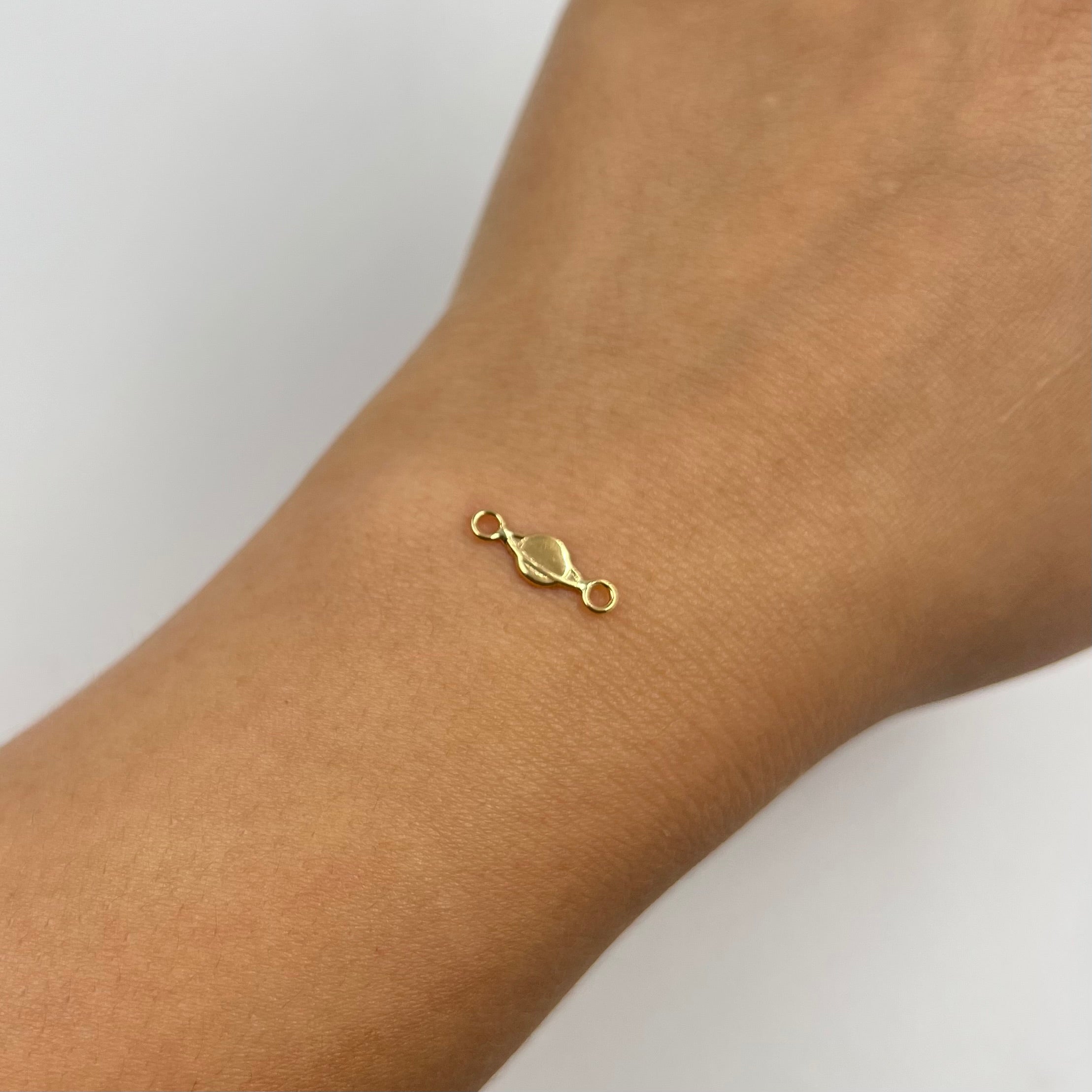 HERRAJE PLANETA  ORO AMARILLO 18K 0,19 GR / 1,4 CM