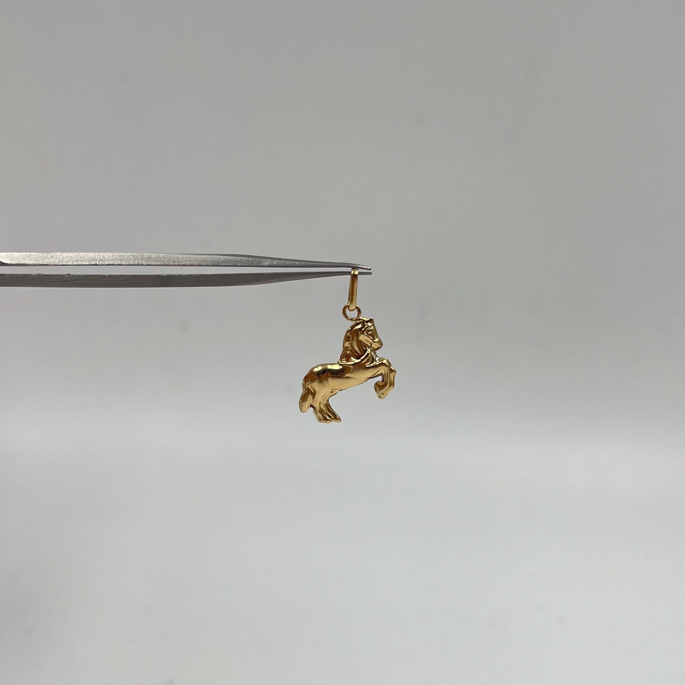 DIJE CABALLO  ORO AMARILLO 18K 0,71 GR / 16 MM / 1,4 CM