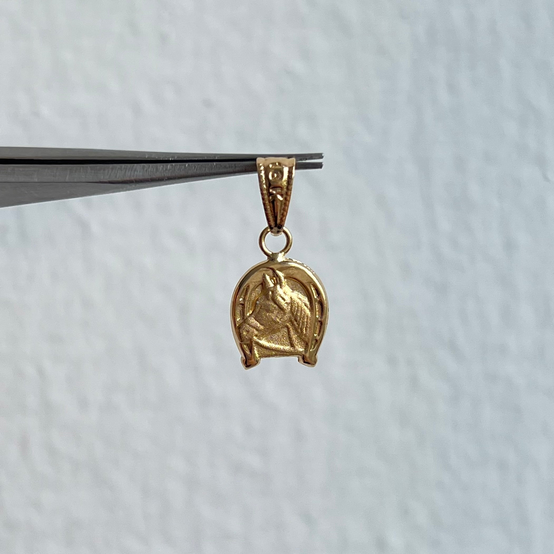 DIJE CABALLO ORO AMARILLO 18K 0,62 GR / 9 MM / 1,3 CM