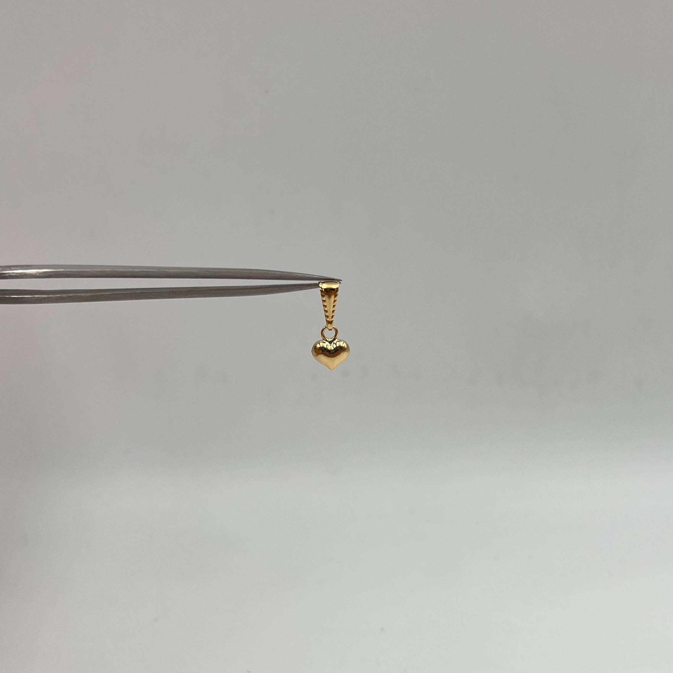 DIJE CORAZON  ORO AMARILLO 18K 0,35 GR / 6 MM / 0,8 CM