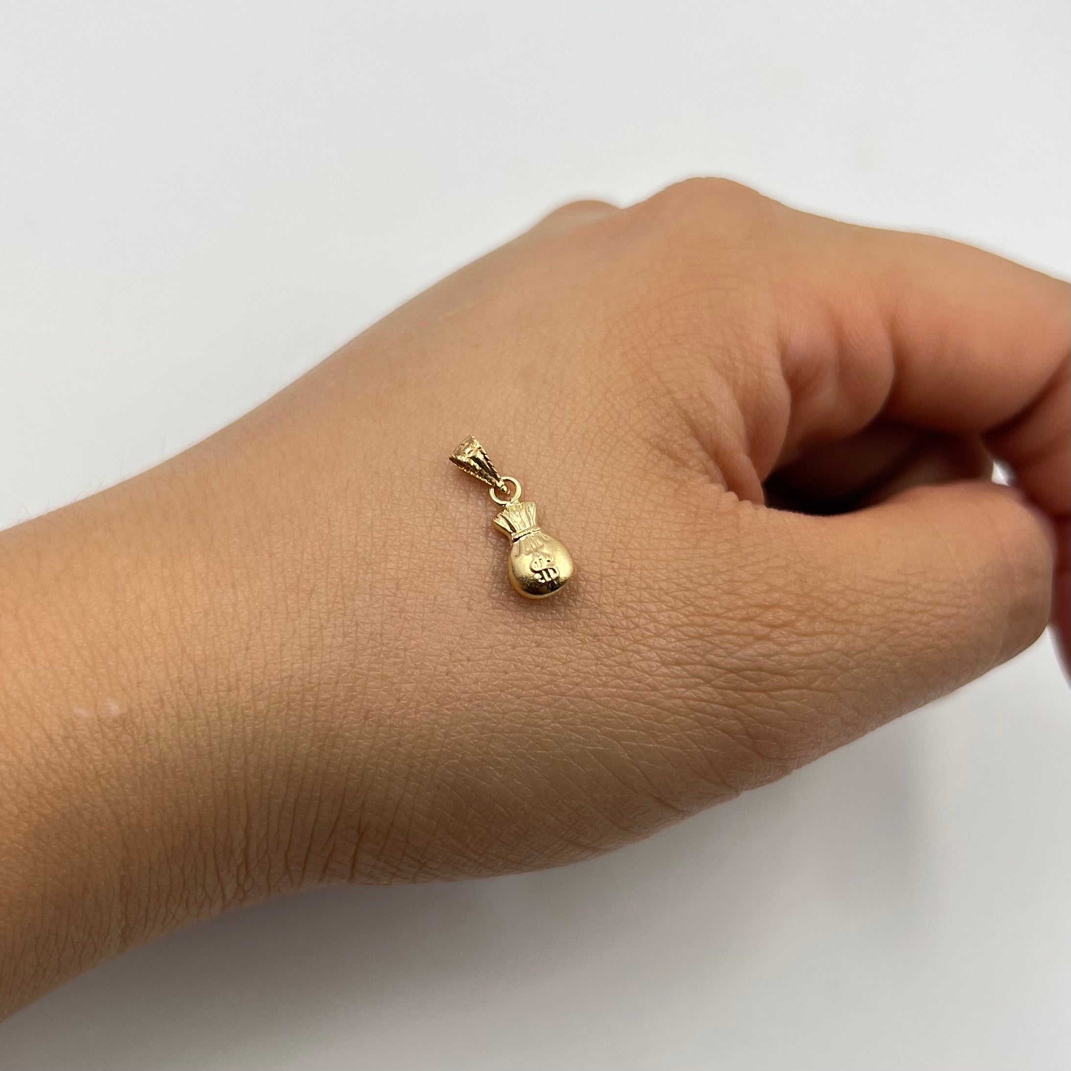 DIJE BOLSA DINERO ORO AMARILLO 18K 0,30 GR / 5,61 MM / 1,1 CM