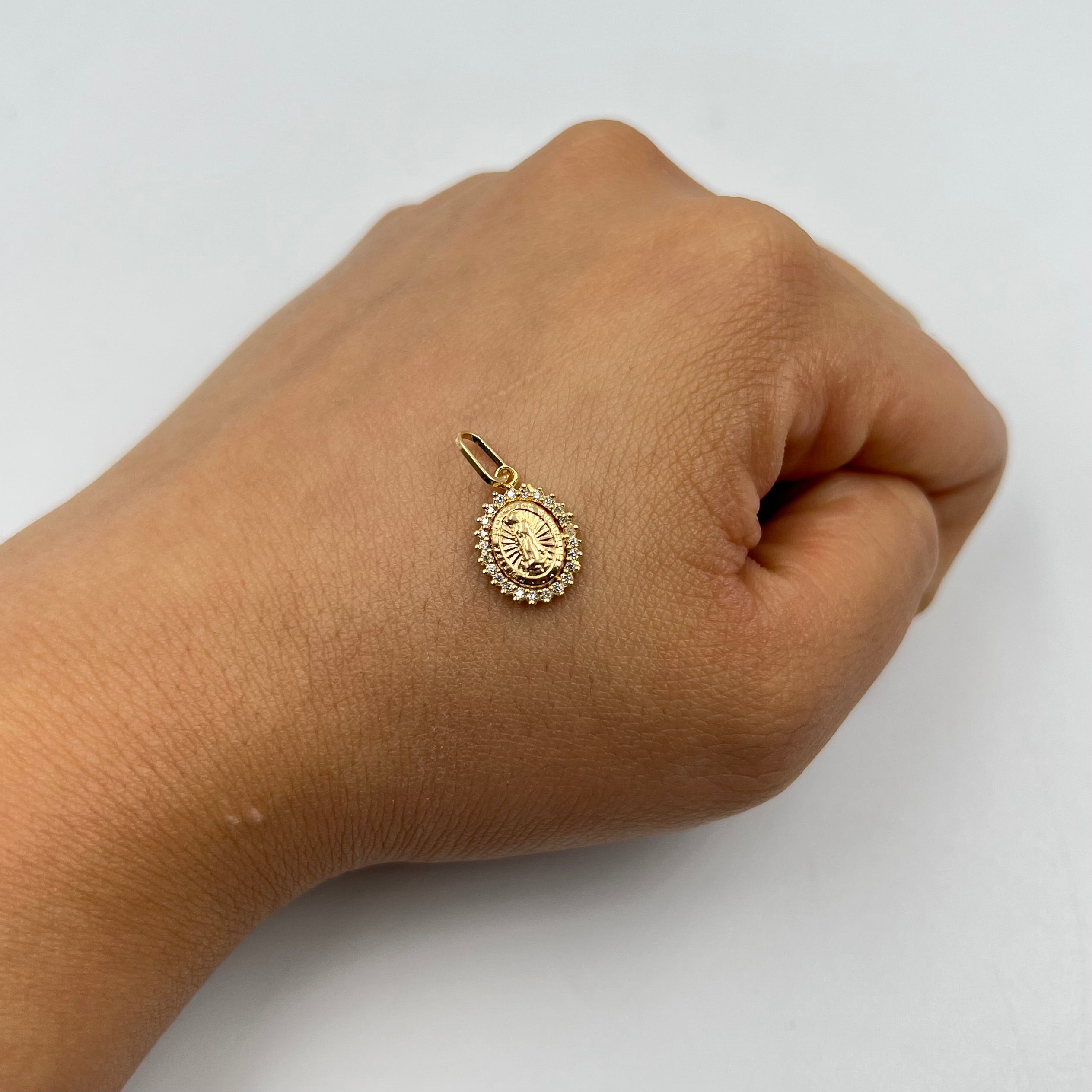 DIJE VIRGEN DE GUADALUPE CASTING CLANCO   ORO AMARILLO 18K +1 / 0,65 GR / 9 MM / 1,3 CM