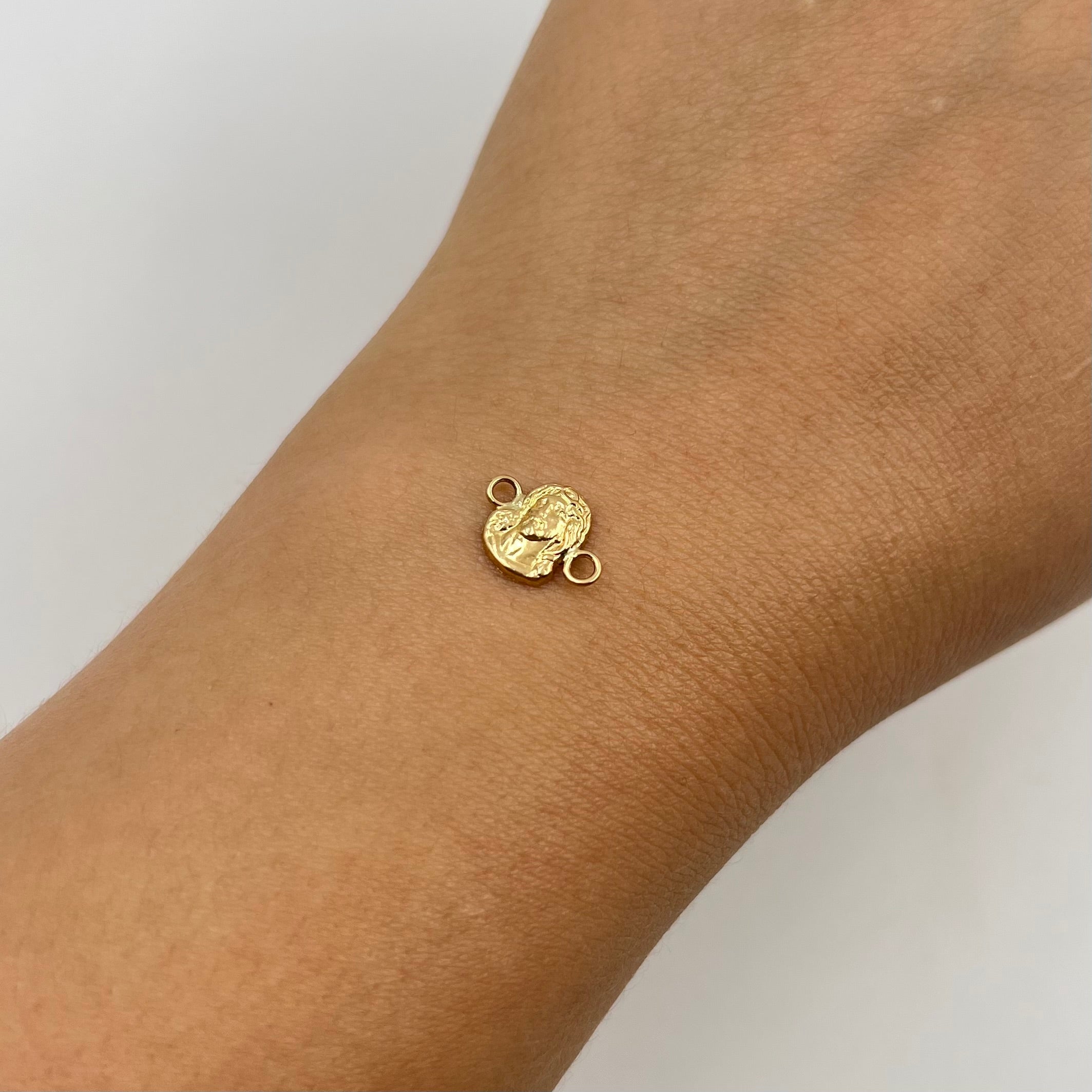 HERRAJE ROSTRO DE JESUS  ORO AMARILLO 18K 0,31 GR / 1,1 CM