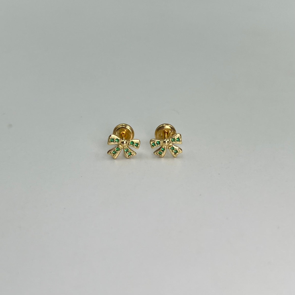 TOPOS MOÑO CIRCONES VERDES ORO AMARILLO 18K 0,93 GR / 7 MM