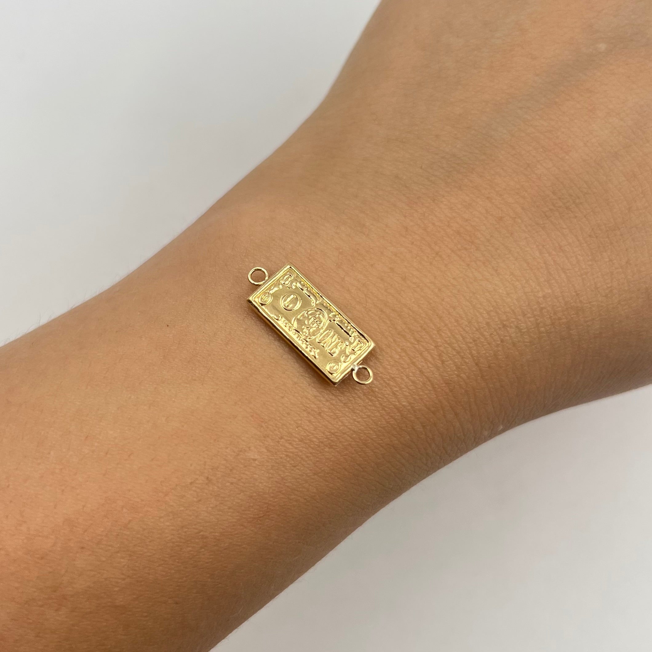 HERRAJE DOLAR  ORO AMARILLO 18K 0,84 GR / 2,2 CM