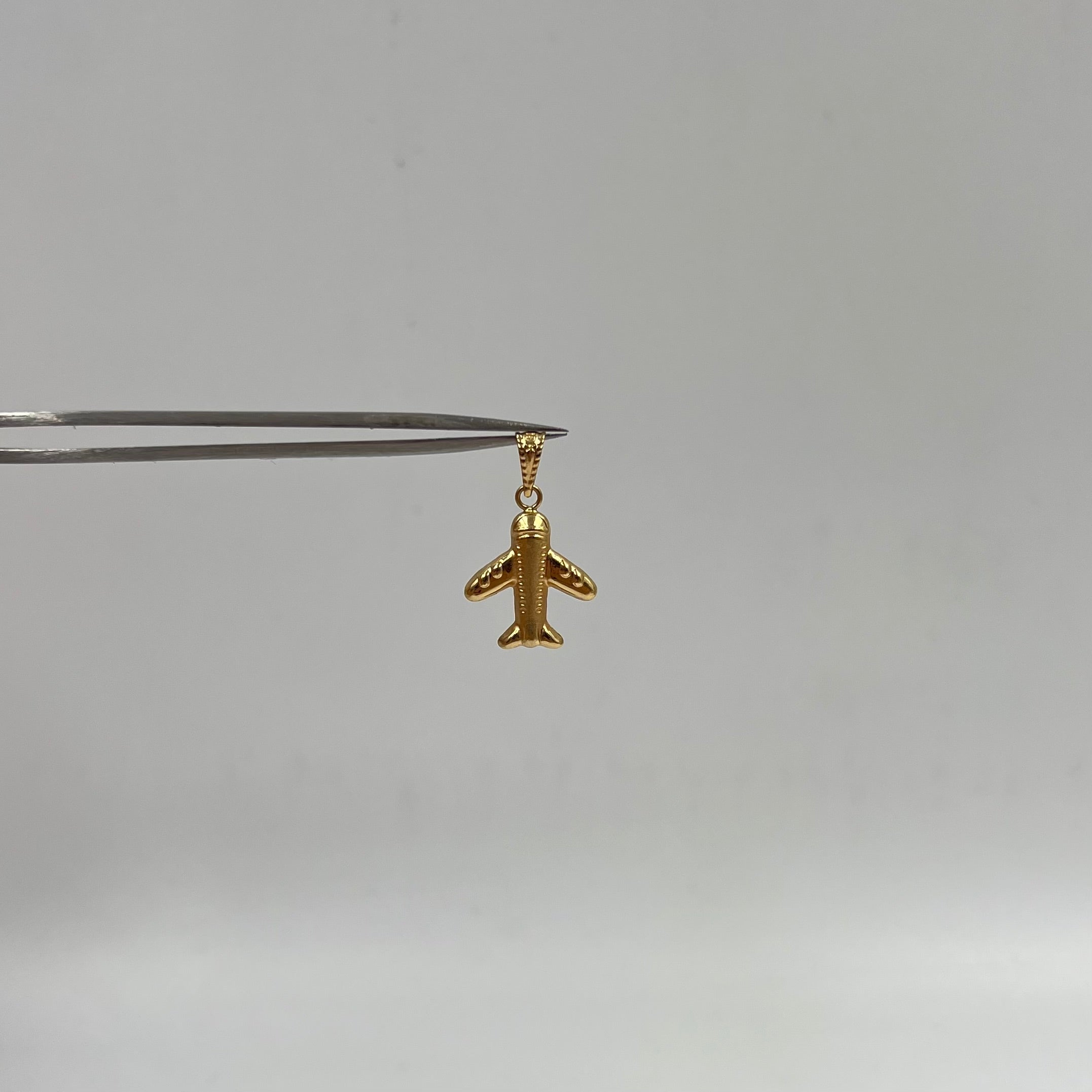 DIJE AVION MATIZADO  ORO AMARILLO 18K 0,69 GR / 6 MM / 1,7 CM