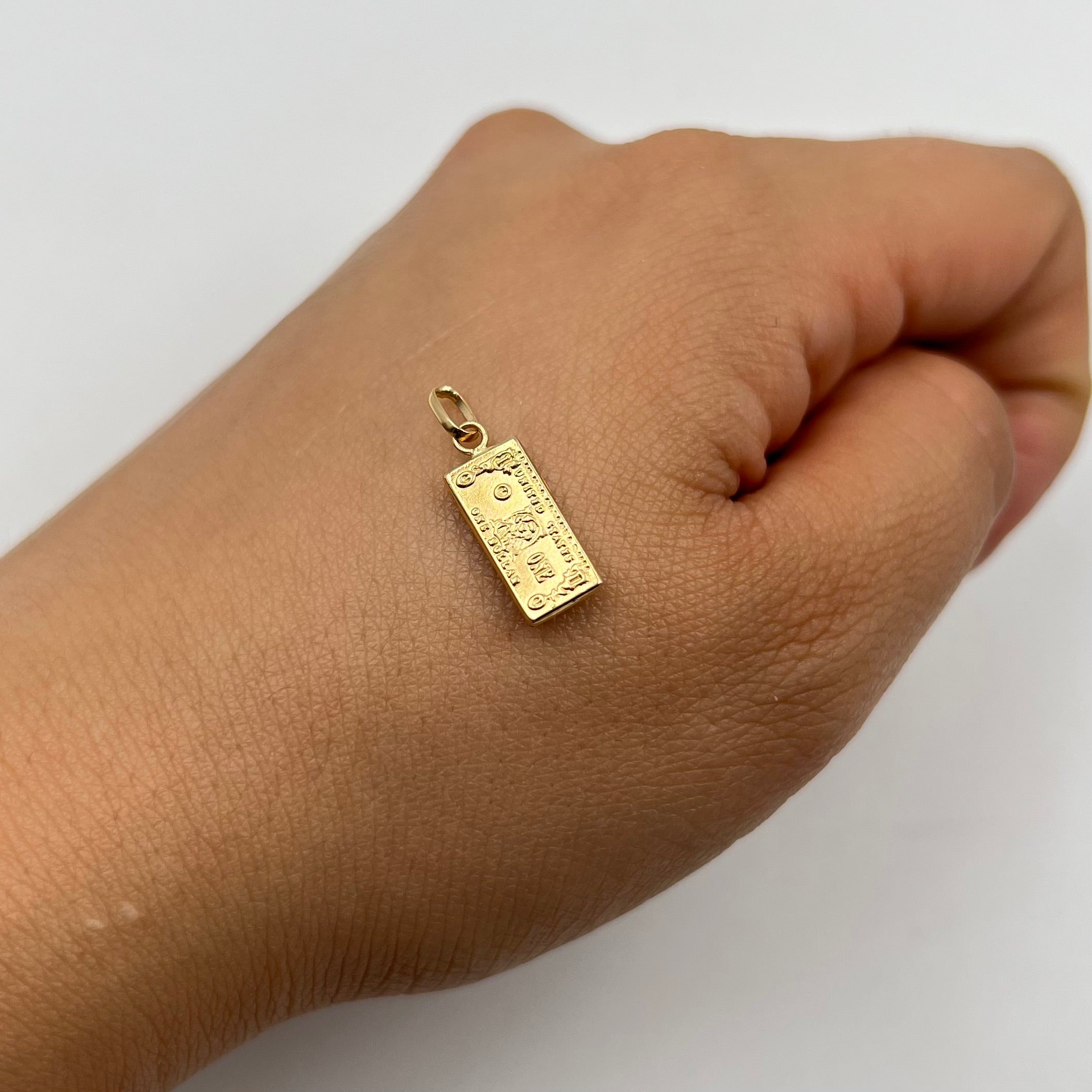 DIJE DOLAR ORO AMARILLO 18K 0,54 GR / 6,5 MM / 1,6 CM