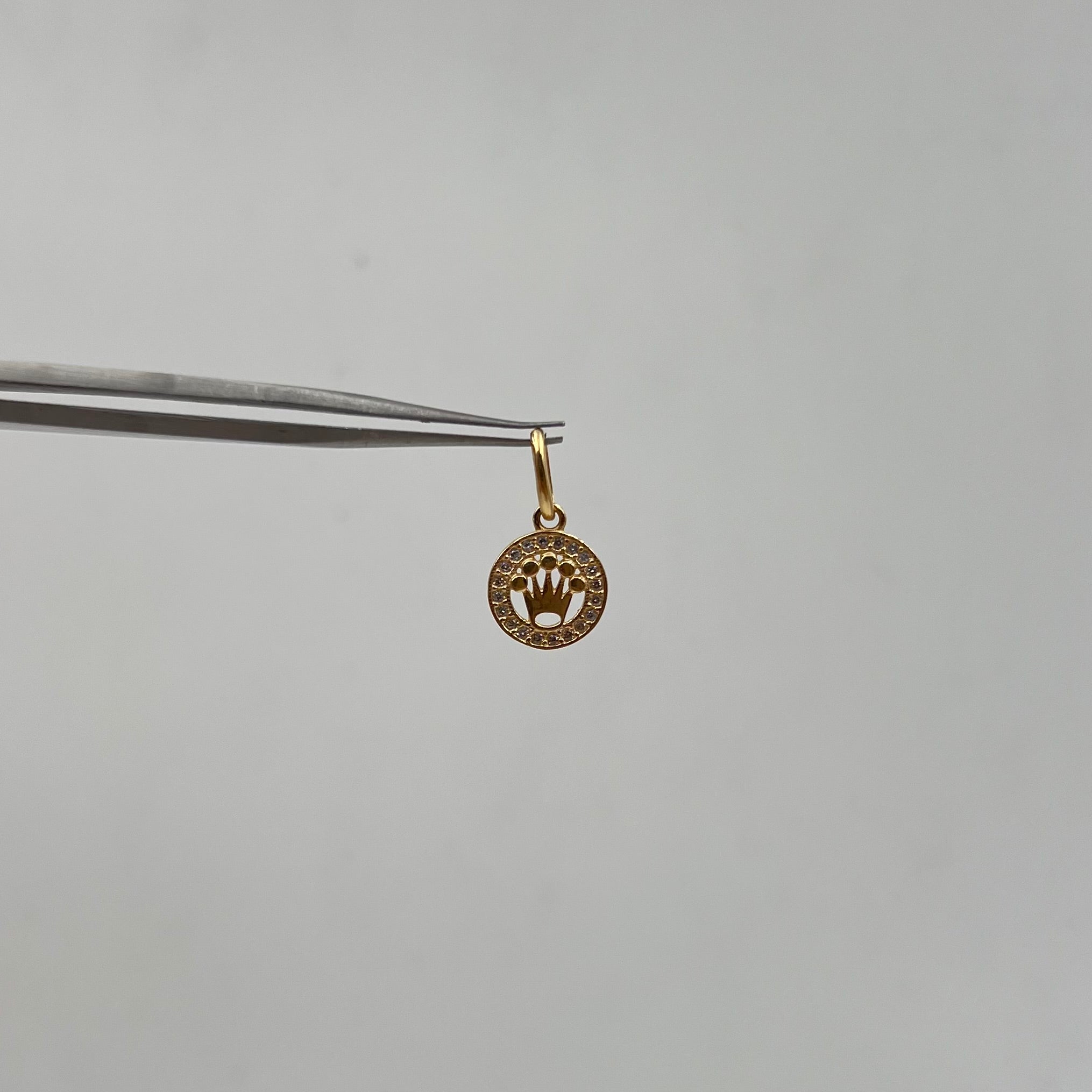 DIJE RX CIRCONES BLANCOS  ORO AMARILLO 18K +2 / 0,9 GR / 9 MM / 1,2 CM