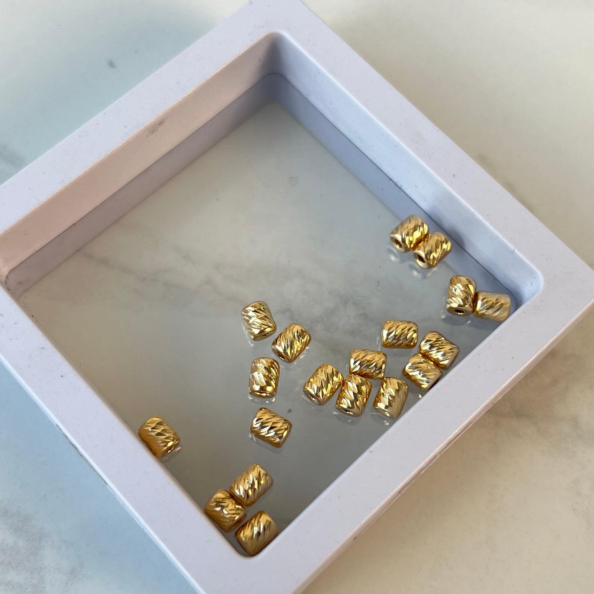 HERRAJE CILINDRO DIAMANTADO  ORO AMARILLO 18K 0,16 GR / 0,5 CM