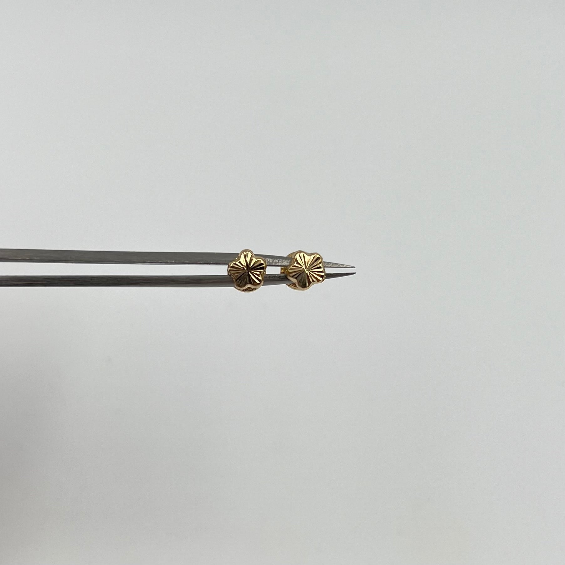 TOPOS FLOR  ORO AMARILLO 18K 0,55 GR / 5 MM