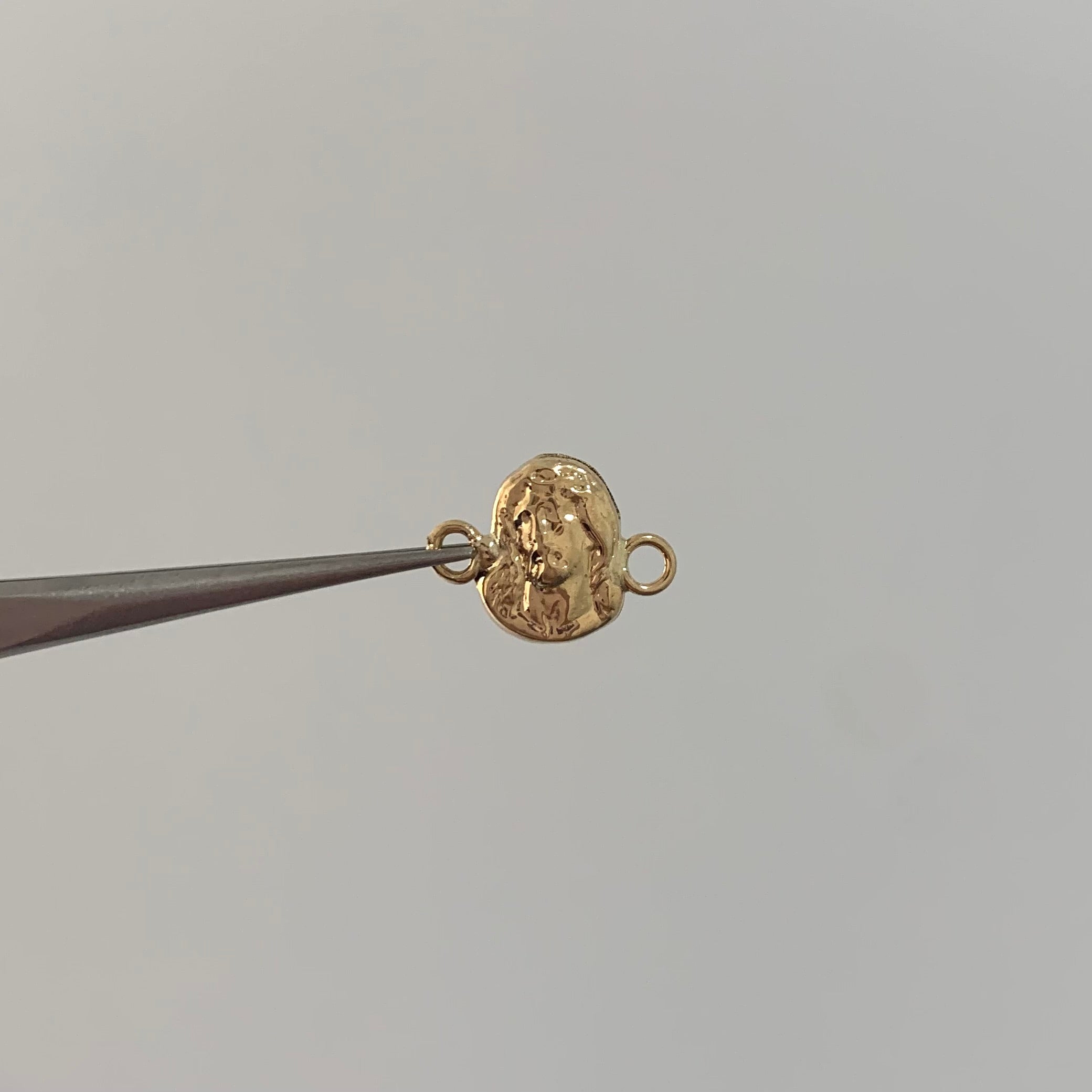 HERRAJE ROSTRO DE JESUS ORO AMARILLO 18K 0,3 GR / 1,1 CM