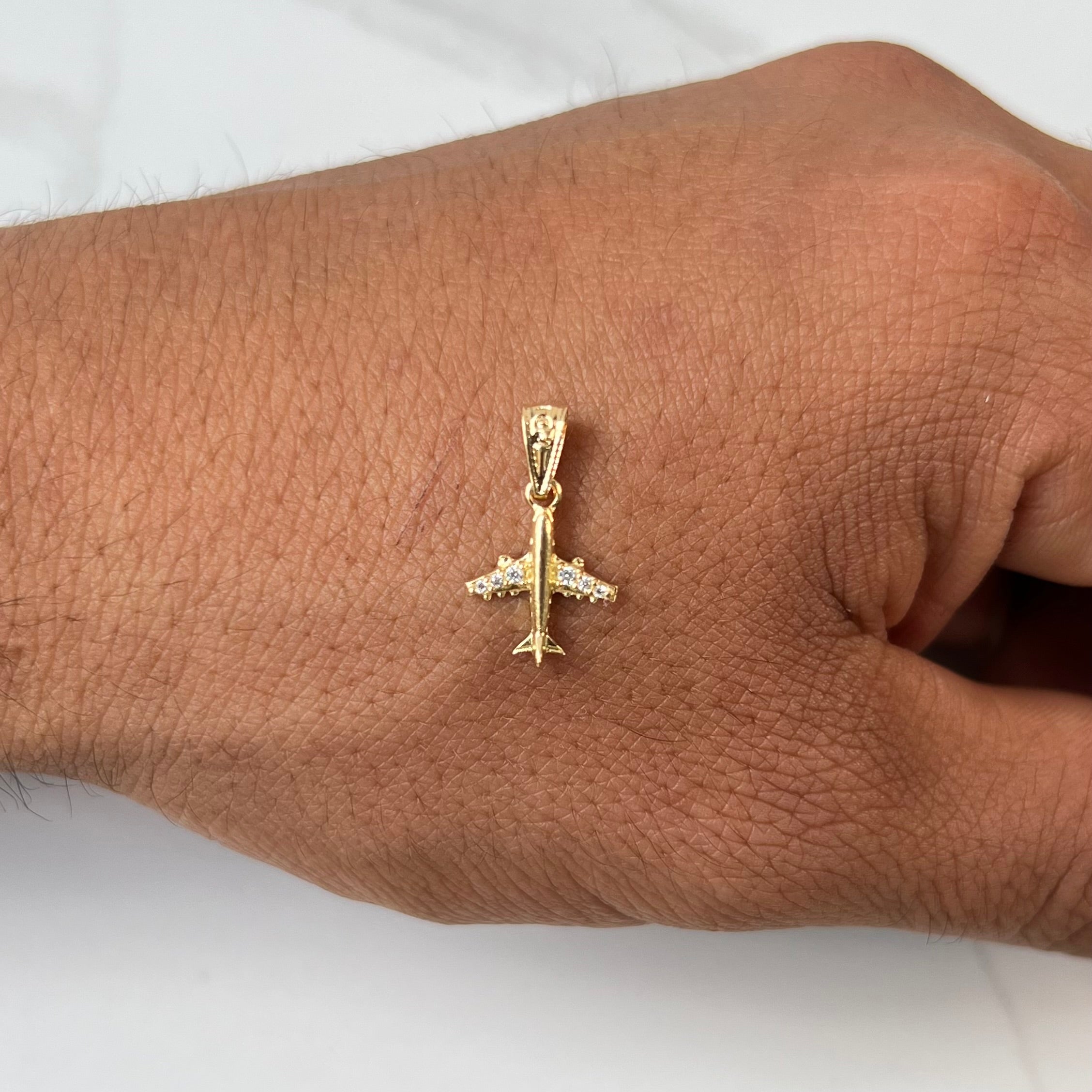 DIJE AVION CON CIRCON BLANCO  ORO AMARILLO 18K 0,57 GR / 10 MM / 1,3 CM