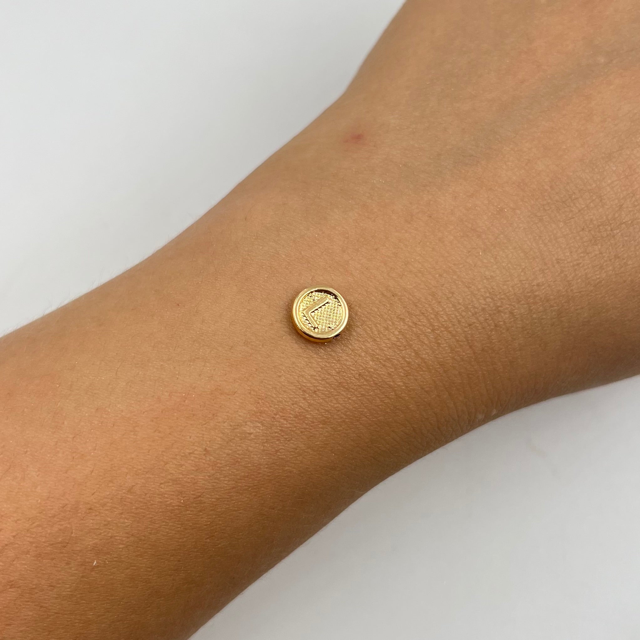 HERRAJE LETRA L TAMBOR ORO AMARILLO 18K 0,31 GR / 0,8 CM