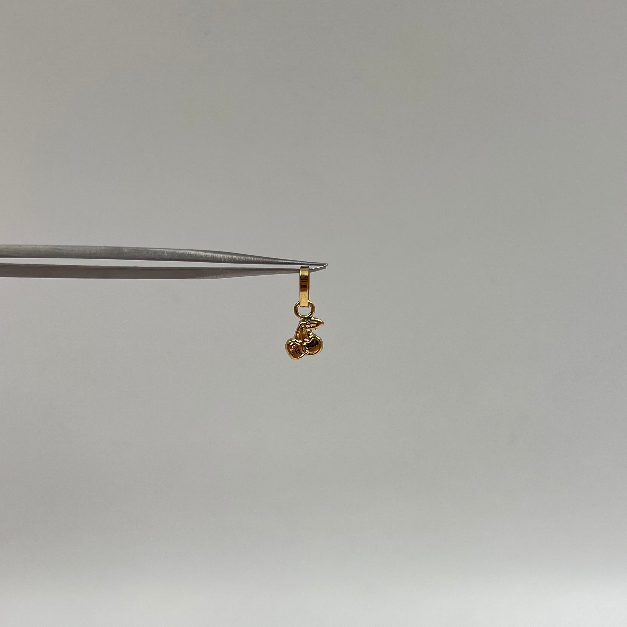 DIJE CEREZA  ORO AMARILLO 18K 0,28 GR / 5 MM / 0,8 CM