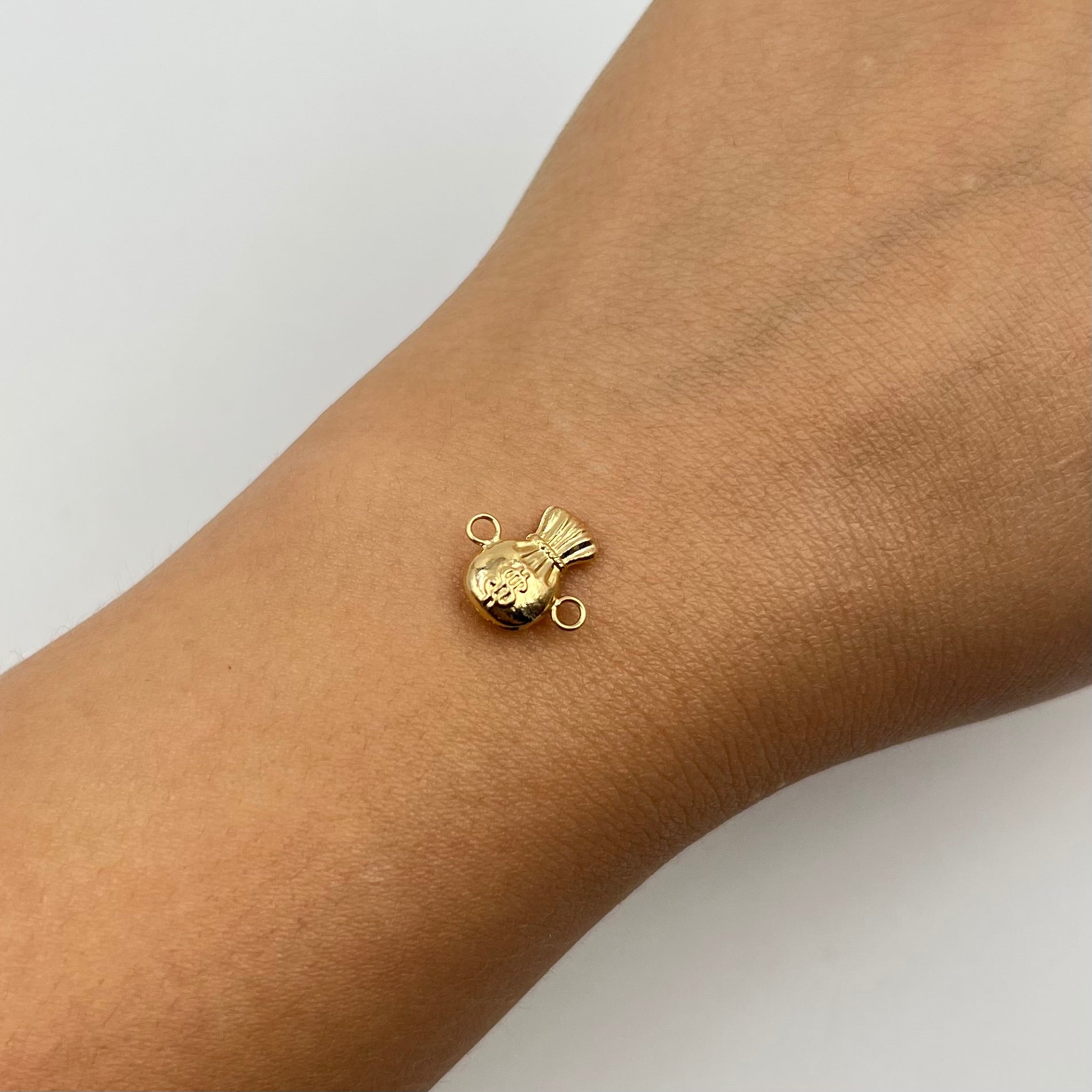 HERRAJE BOLSA DE DINERO  ORO AMARILLO 18K 0,4 GR / 1,2 CM