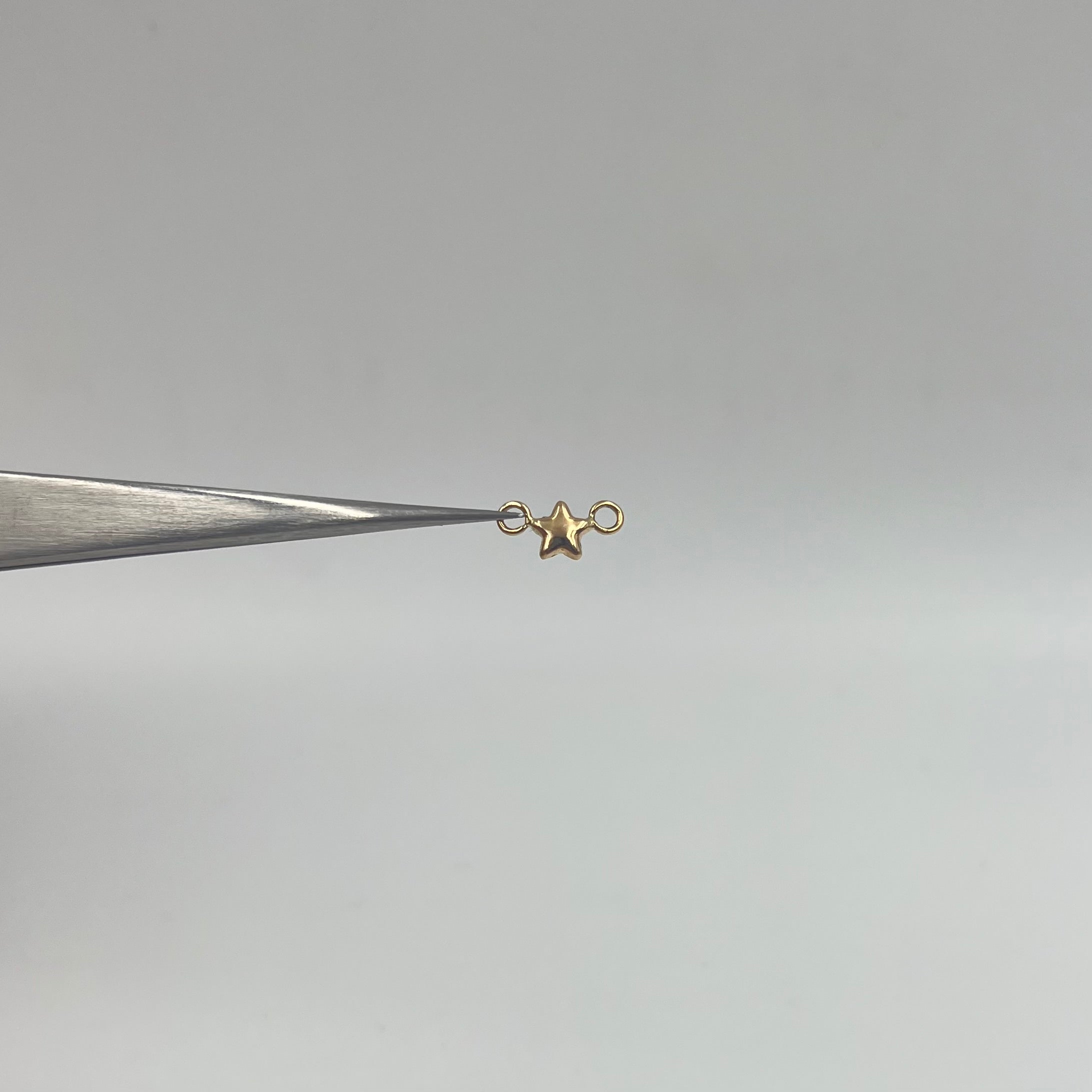 HERRAJE ESTRELLA  ORO AMARILLO 18K 0,14 GR / 1 CM