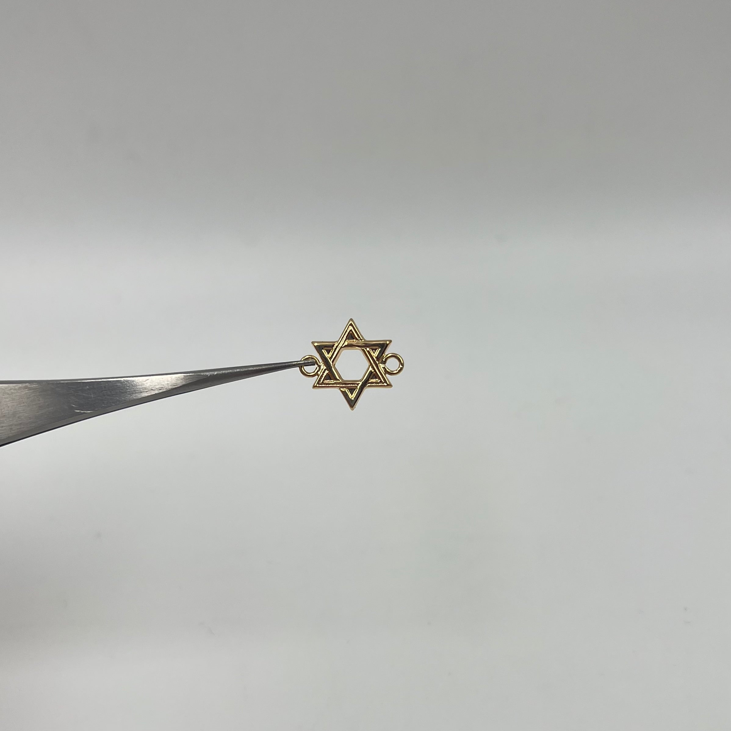 HERRAJE ESTRELLA DE DAVID  ORO AMARILLO 18K 0,54 GR / 1,4 CM