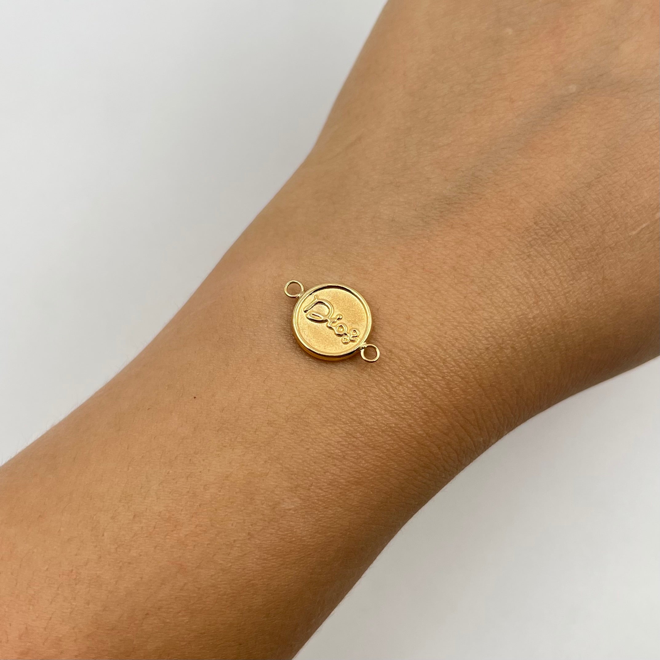 HERRAJE DIOS  ORO AMARILLO 18K 0,77 GR / 1,8 CM