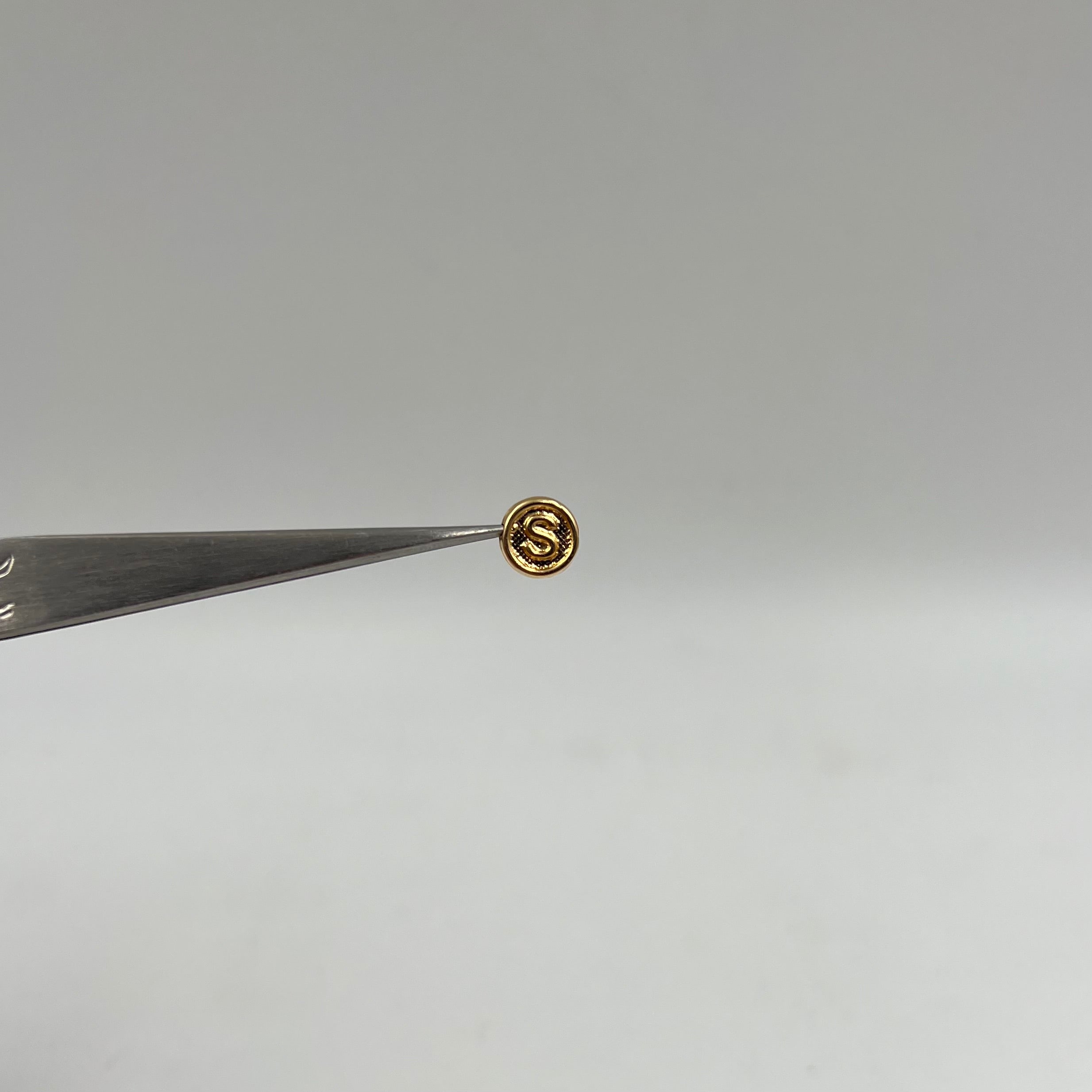 HERRAJE LETRA S TAMBOR ORO AMARILLO 18K 0,27 GR / 0,8 CM