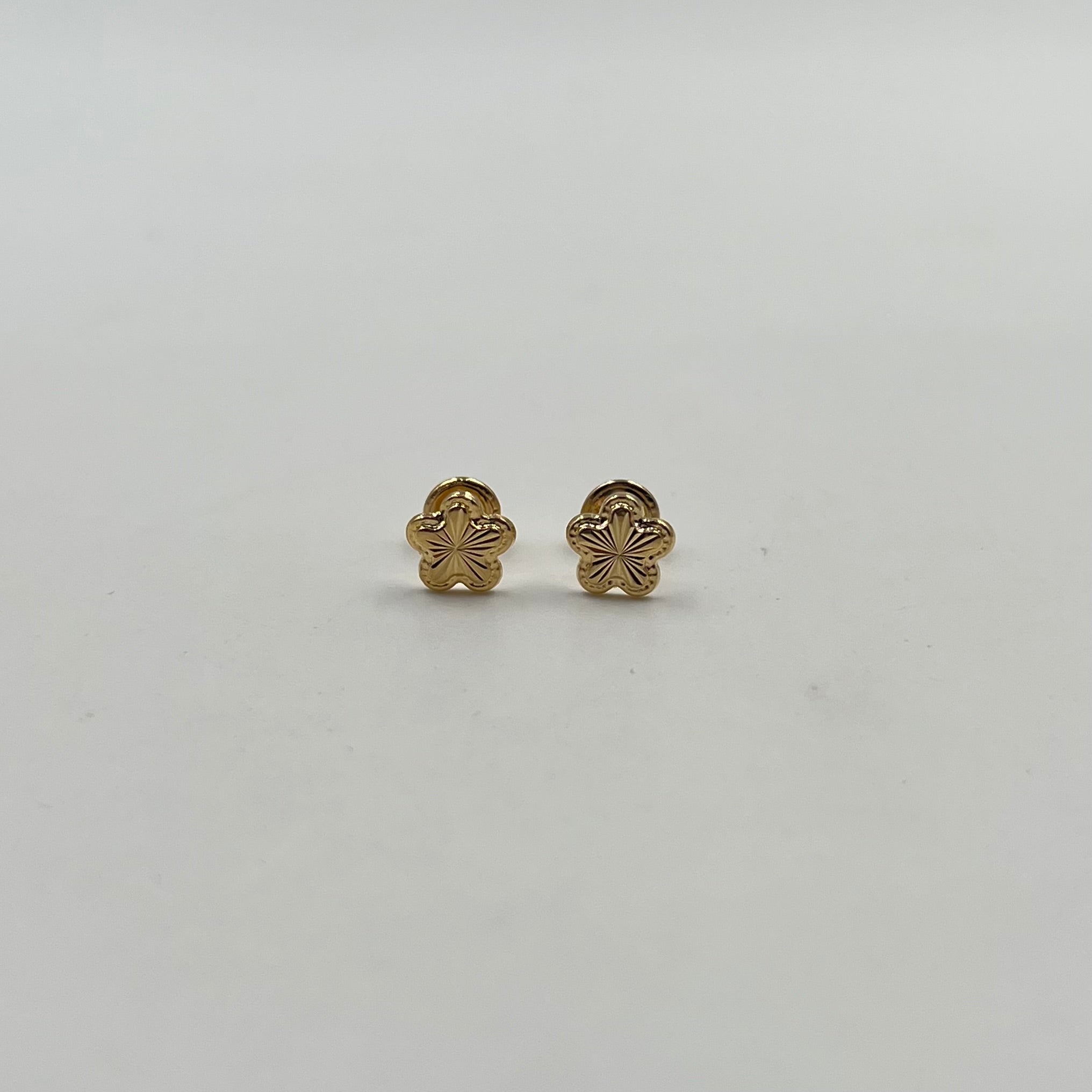 TOPOS FLOR BORDEADA DIAMANTADA ORO AMARILLO 18K 0,76 GR / 7 MM