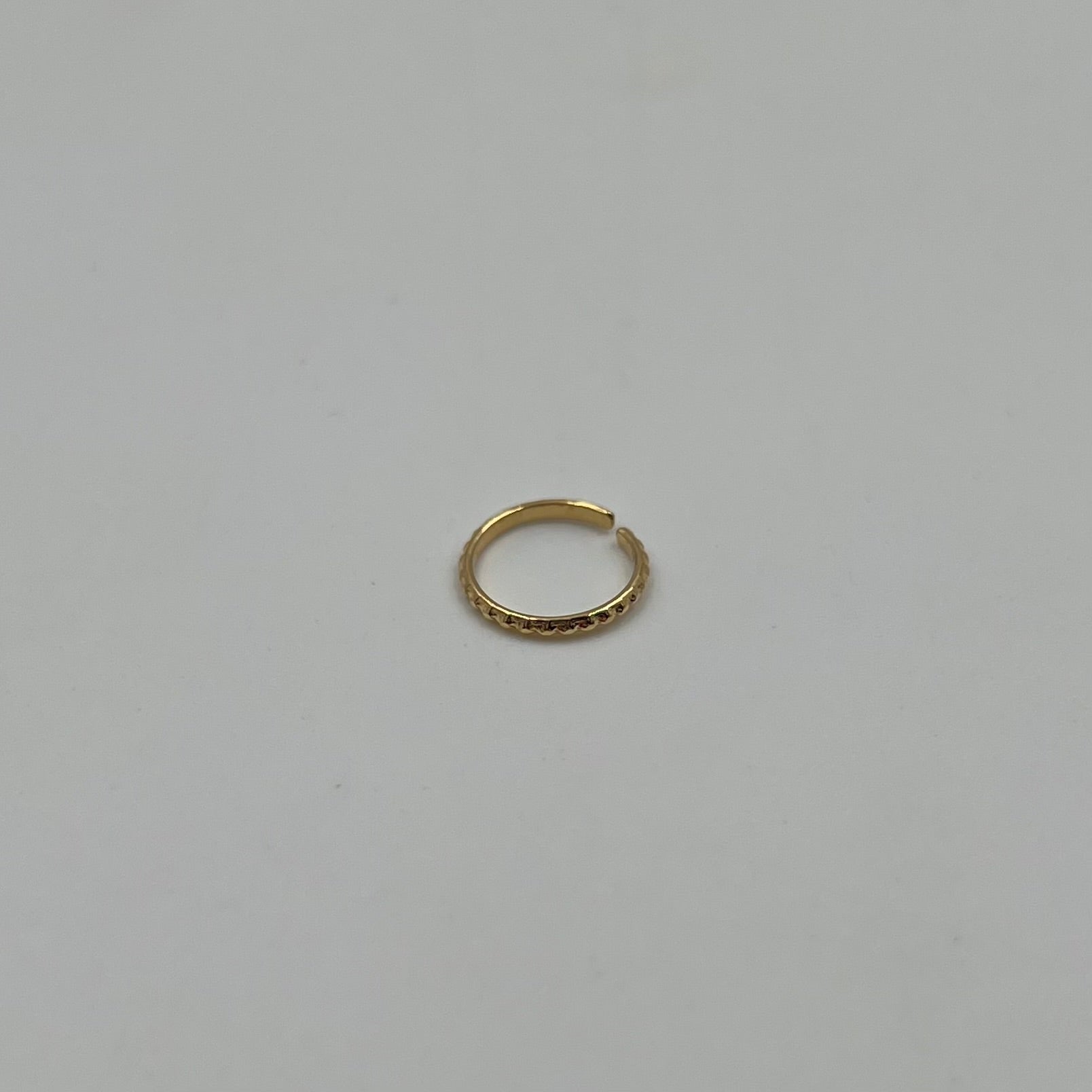 PIERCING ARGOLLA ENTORCHADO 0.25 GRAMOS 9MM