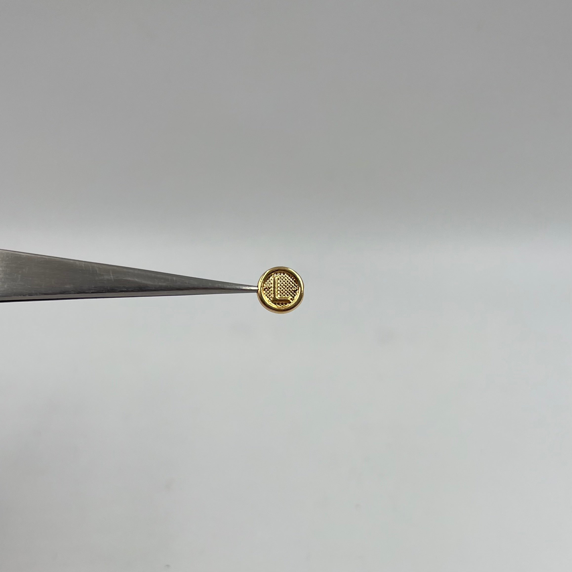 HERRAJE LETRA L TAMBOR ORO AMARILLO 18K 0,31 GR / 0,8 CM