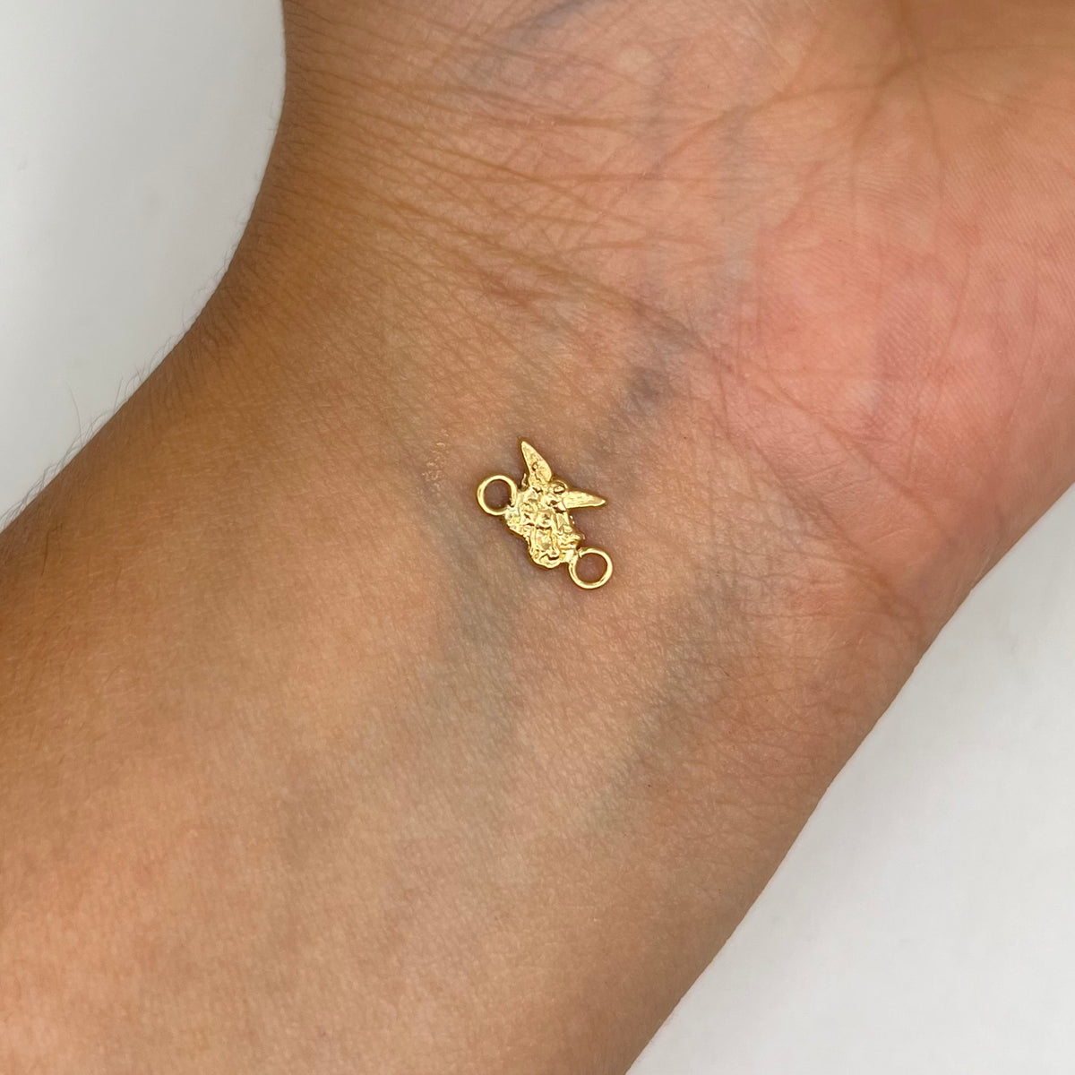 HERRAJE SAN MIGUEL ARCANGEL SILUETA ORO AMARILLO 18K 0,21 GR / 1 CM