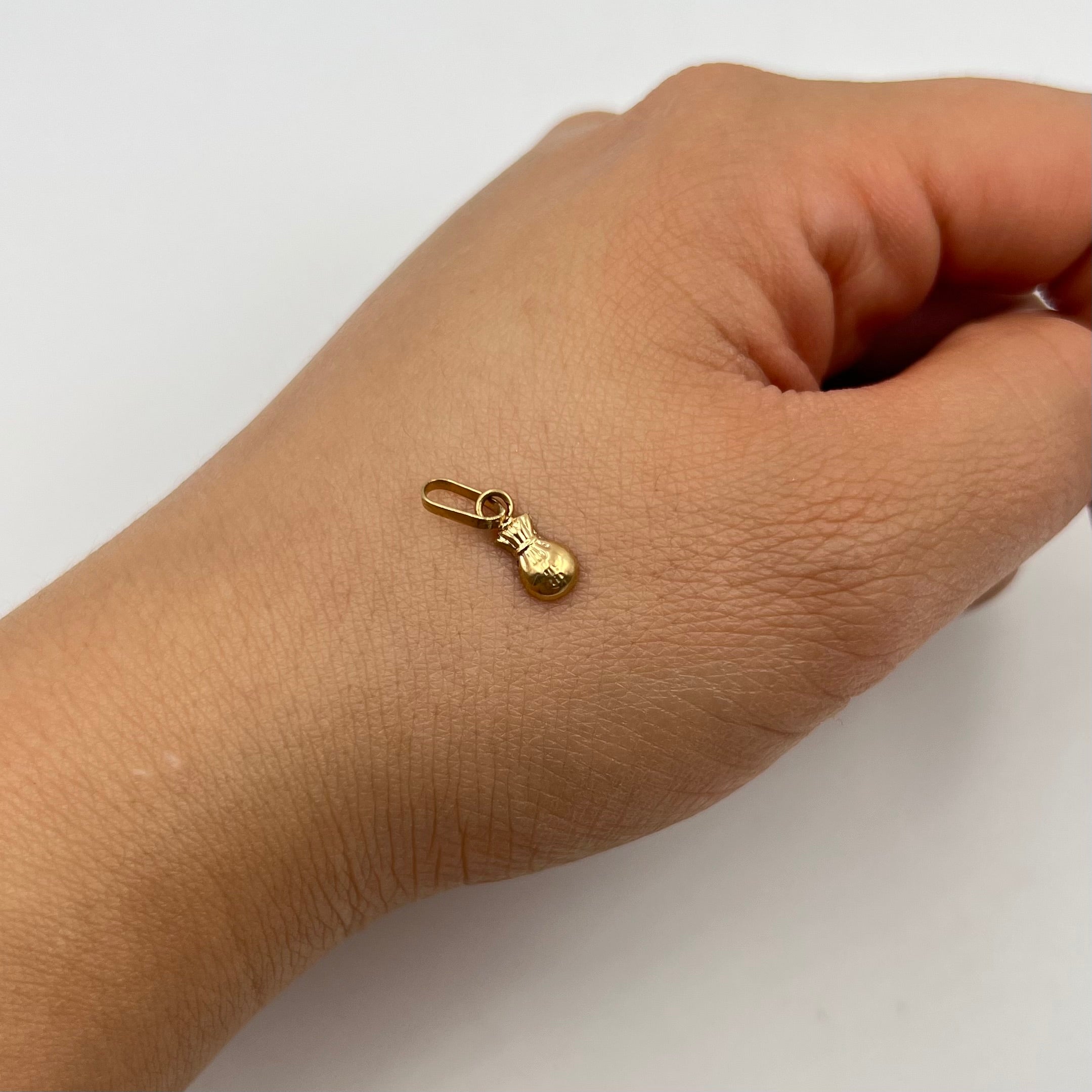 DIJE BOLSA DE DINERO  ORO AMARILLO 18K 0,23 GR / 4 MM / 1 CM