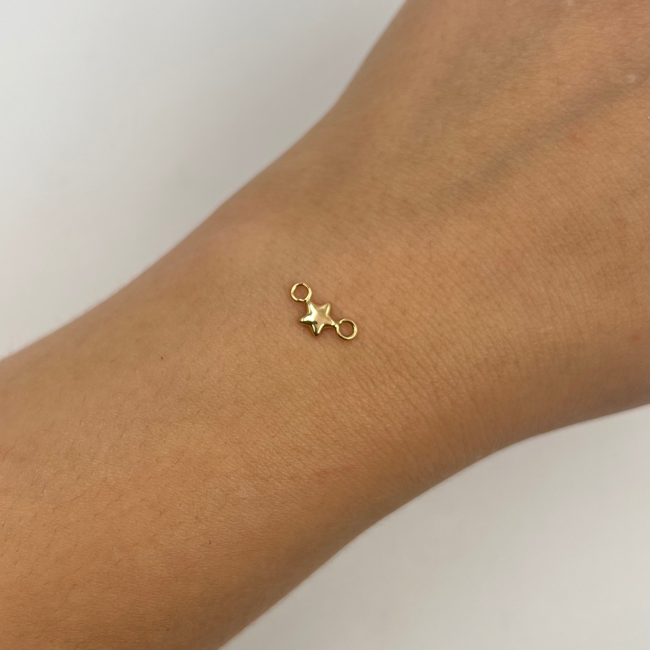 HERRAJE ESTRELLA  ORO AMARILLO 18K 0,14 GR / 1 CM