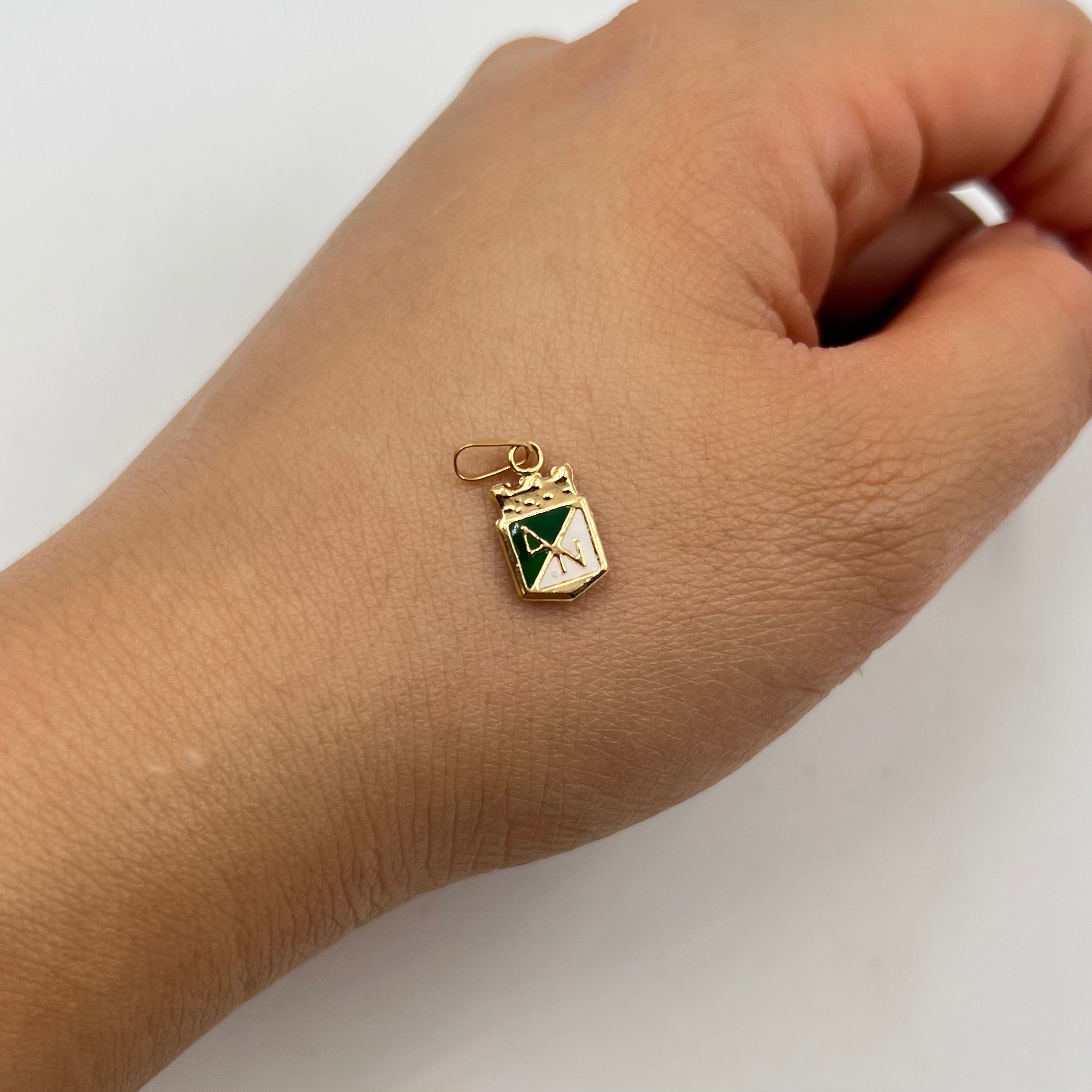 DIJE ESCUDO NACIONAL  ORO AMARILLO 18K 0,38 GR / 7 MM / 1,2 CM