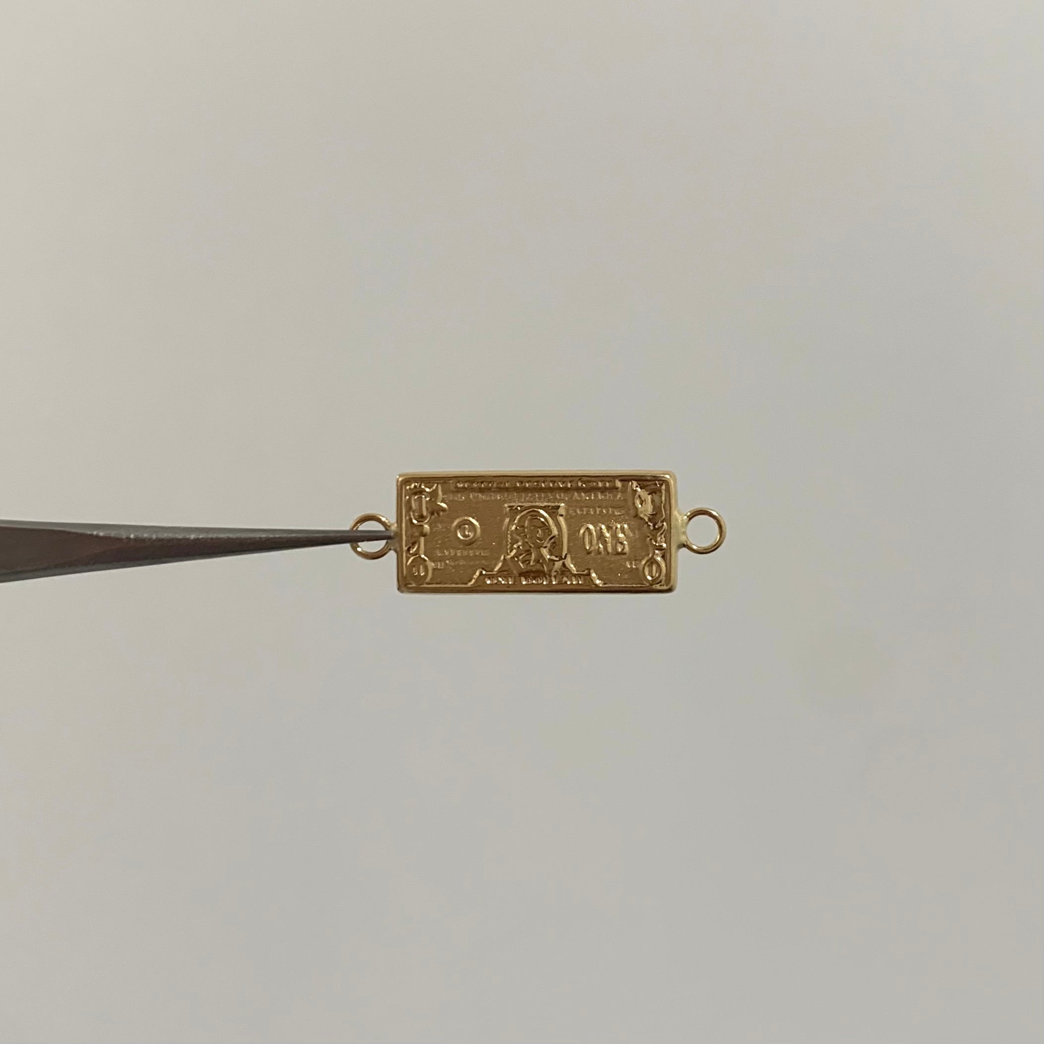 HERRAJE DOLAR ORO AMARILLO 18K 1,2 GR / 2,4 CM