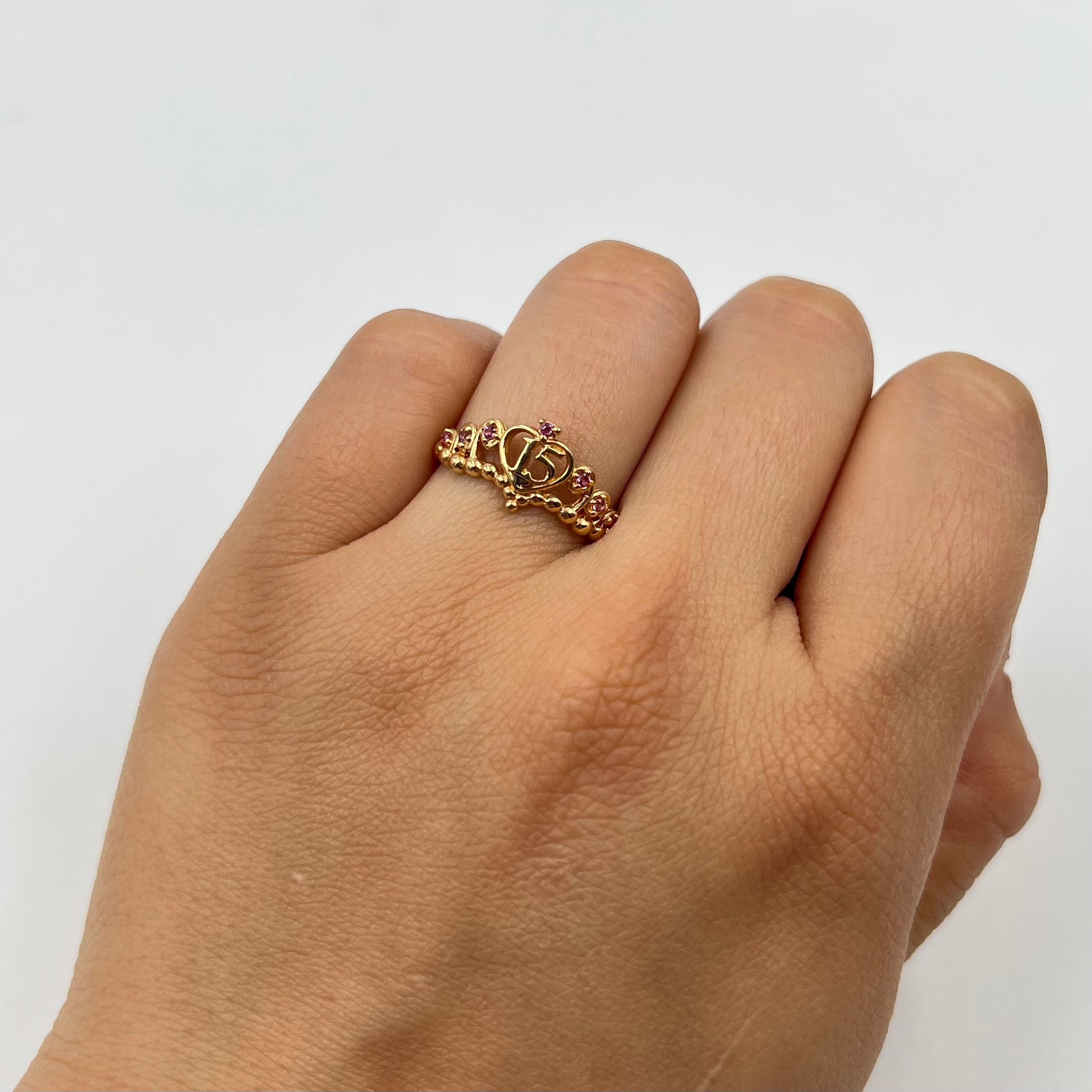 ANILLO 15 AÑOS CORONA CIRCON ROSA  ORO AMARILLO 18K / TALLA 6/5 / 1,79 GR / 9 MM