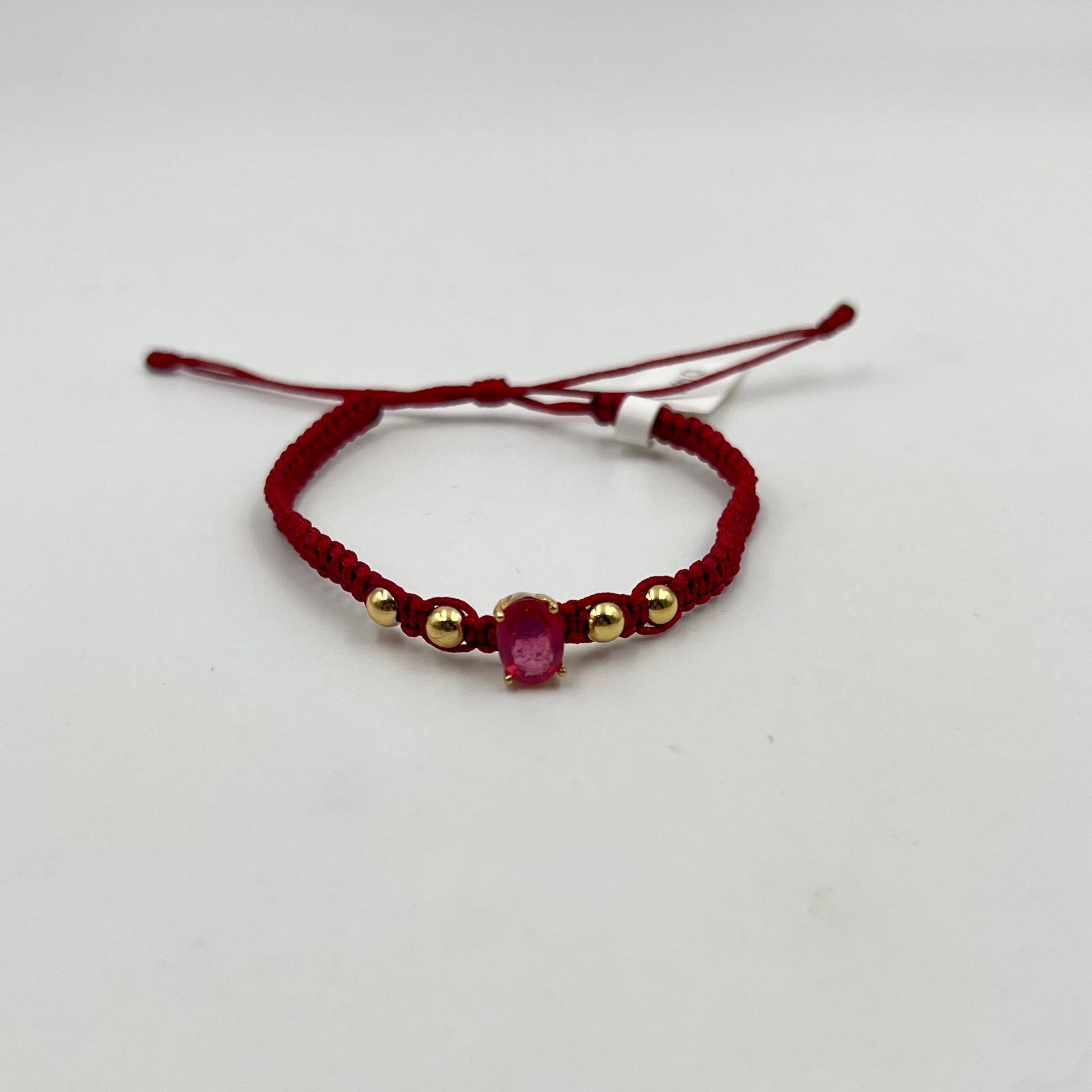 PULSERA TEJIDA VINOTINTO / HERRAJE RUBI 1,5 CT/  BOLA LISA 4MM / 1,07 GR (JOYA)