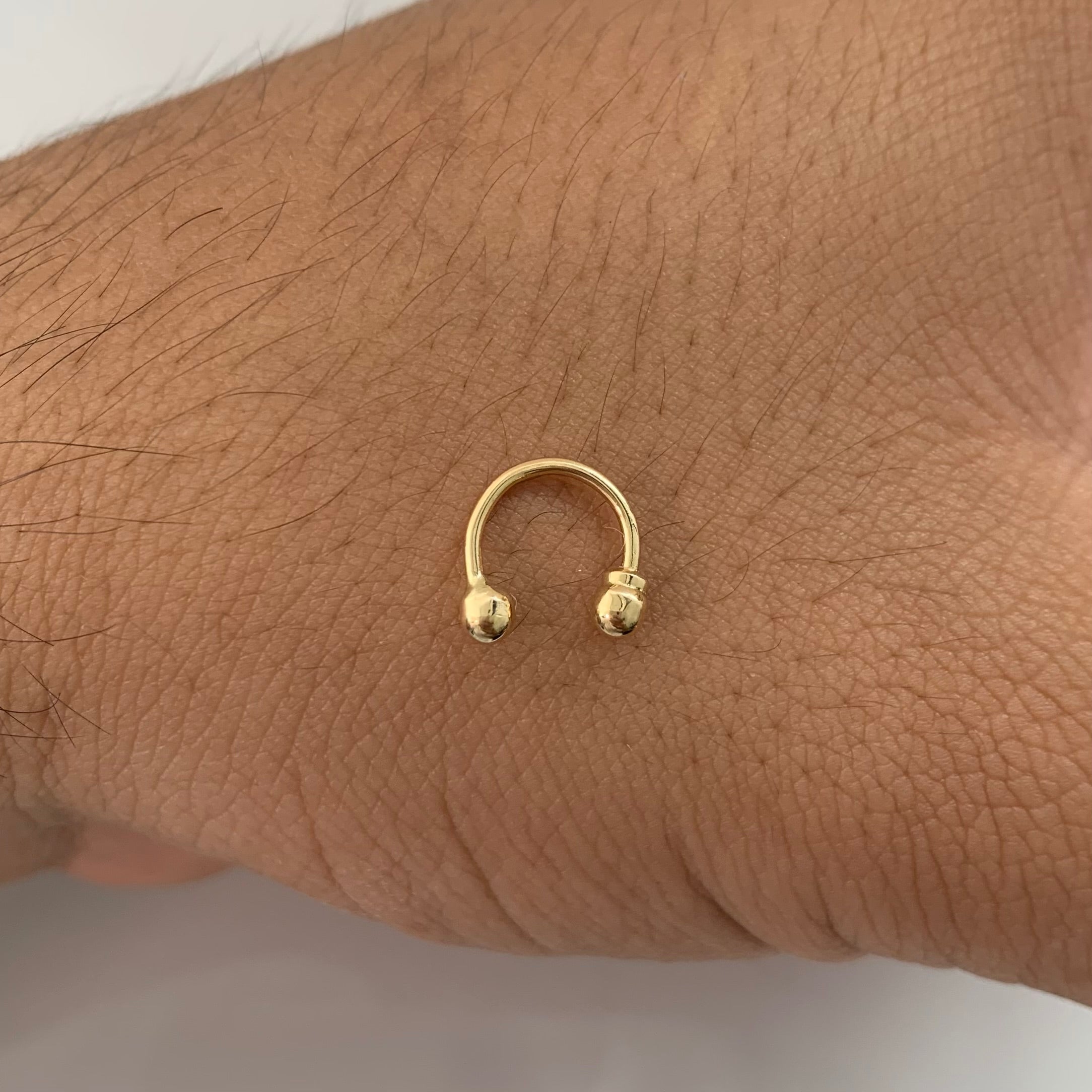 PIERCING CURVO / 1 CM / 0,4 GR