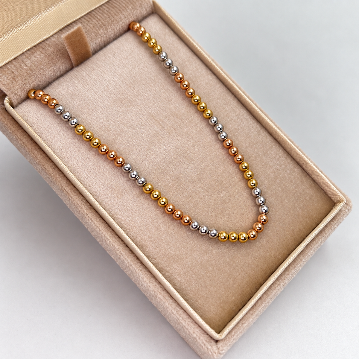 CADENA ITALY BOLA LISA GRADUABLE TRES OROS 18K +3 / 2,71 GR / 3 MM / 45 CM