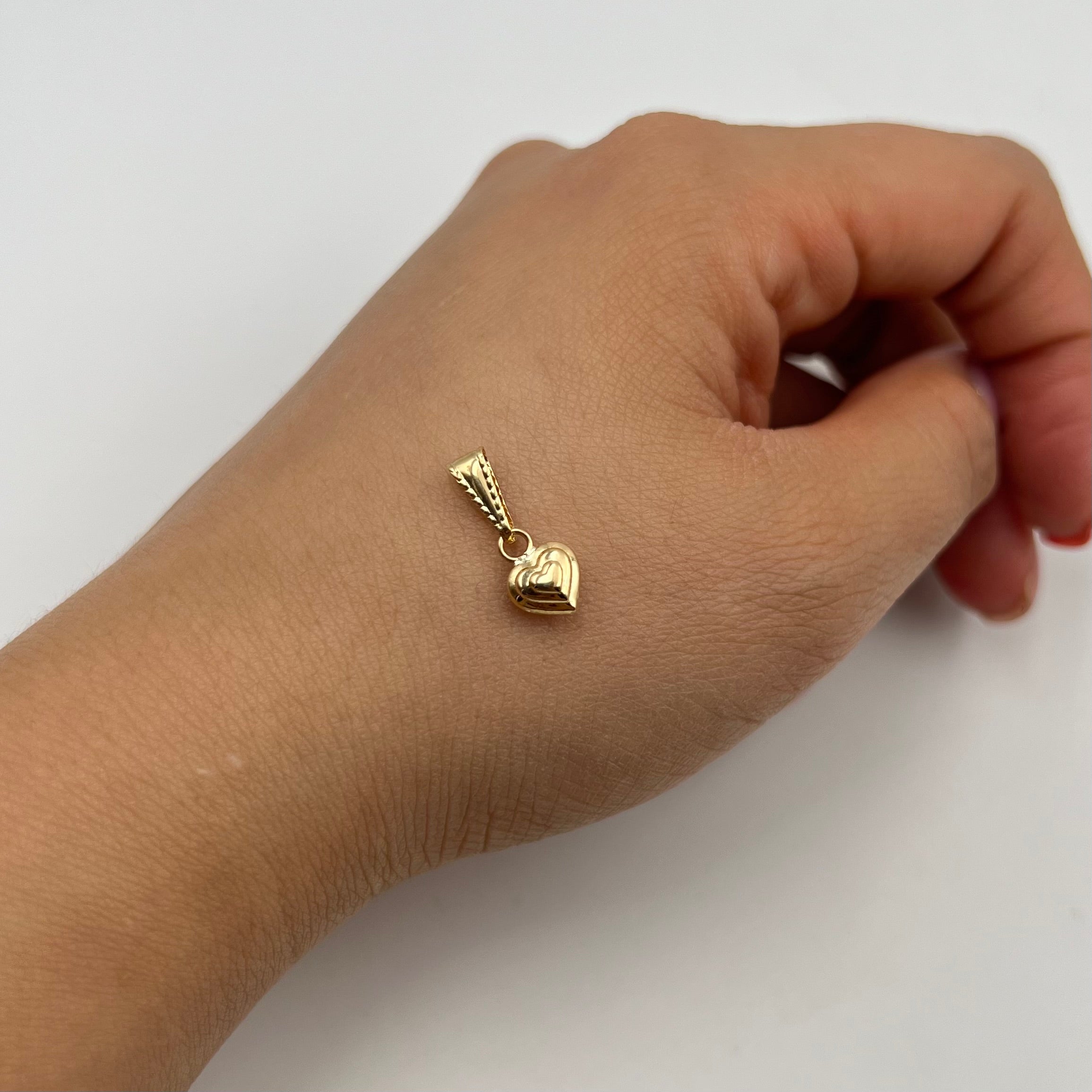 DIJE CORAZON  ORO AMARILLO 18K 0,39 GR / 6 MM / 1 CM