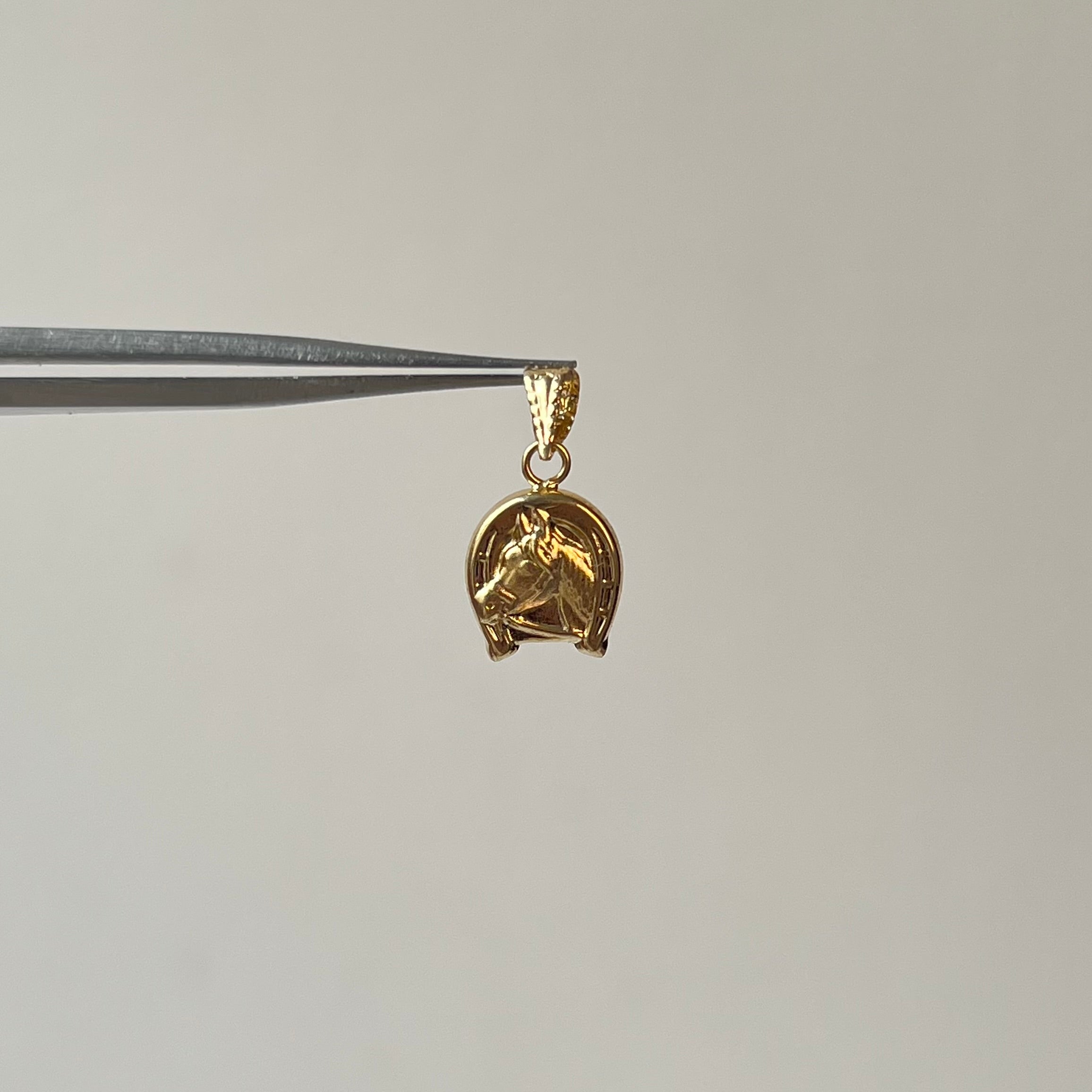 DIJE CABALLO  ORO AMARILLO 18K 0,5 GR / 9 MM / 1,3 CM
