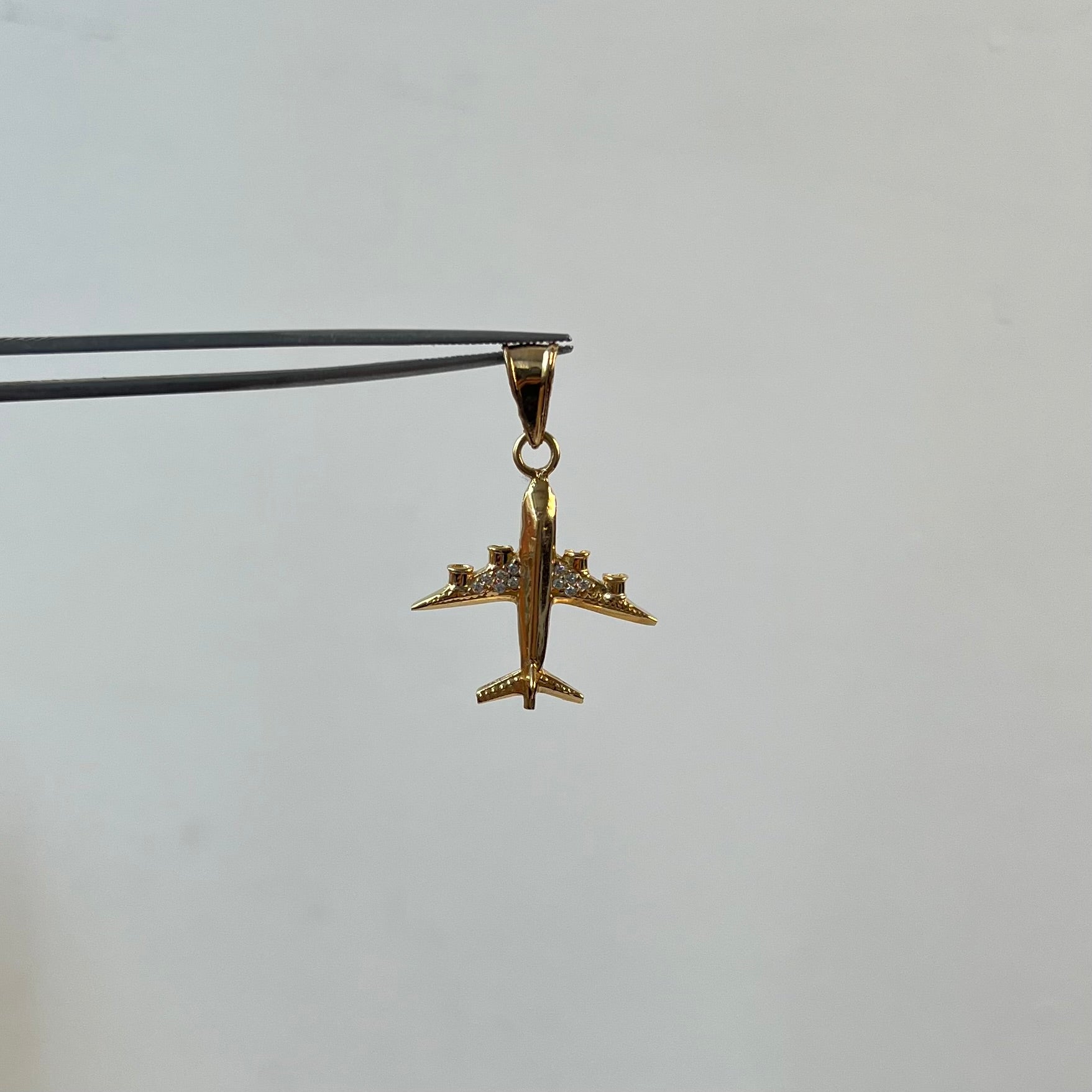 DIJE AVION CON CIRCONES ORO AMARILLO 18K 2,8 GR / 22 MM / 2,6 CM