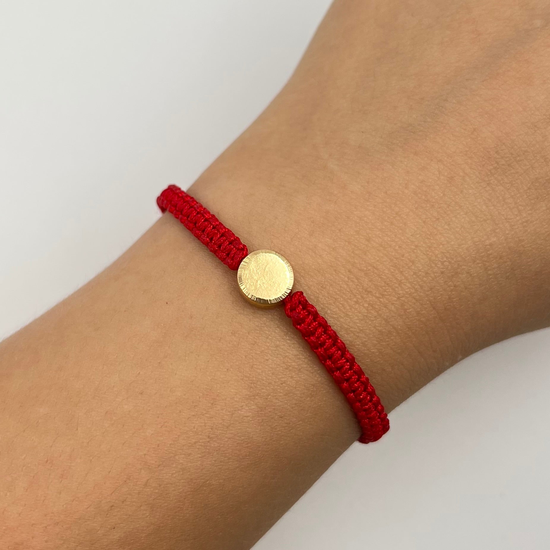 PULSERA TEJIDA ROJA / PLACA TAMBOR