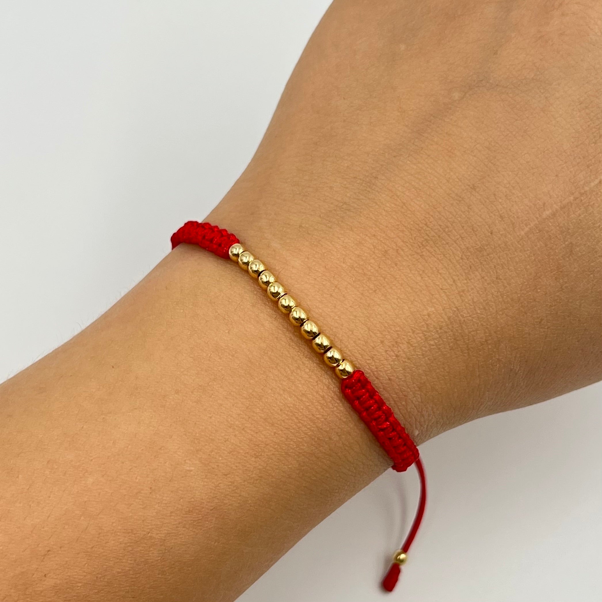 PULSERA TEJIDA ROJA / BOLA LISA 3MM