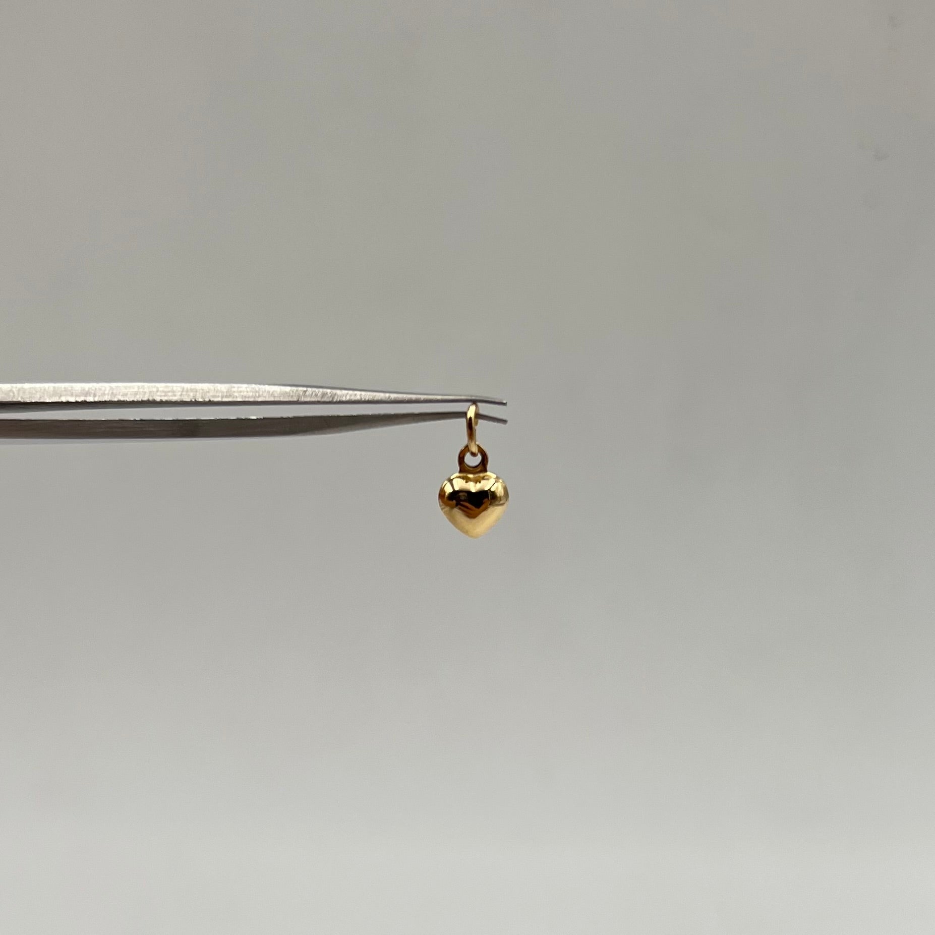 DIJE CORAZON  ORO AMARILLO 18K 0,42 GR / 6 MM / 0,8 CM