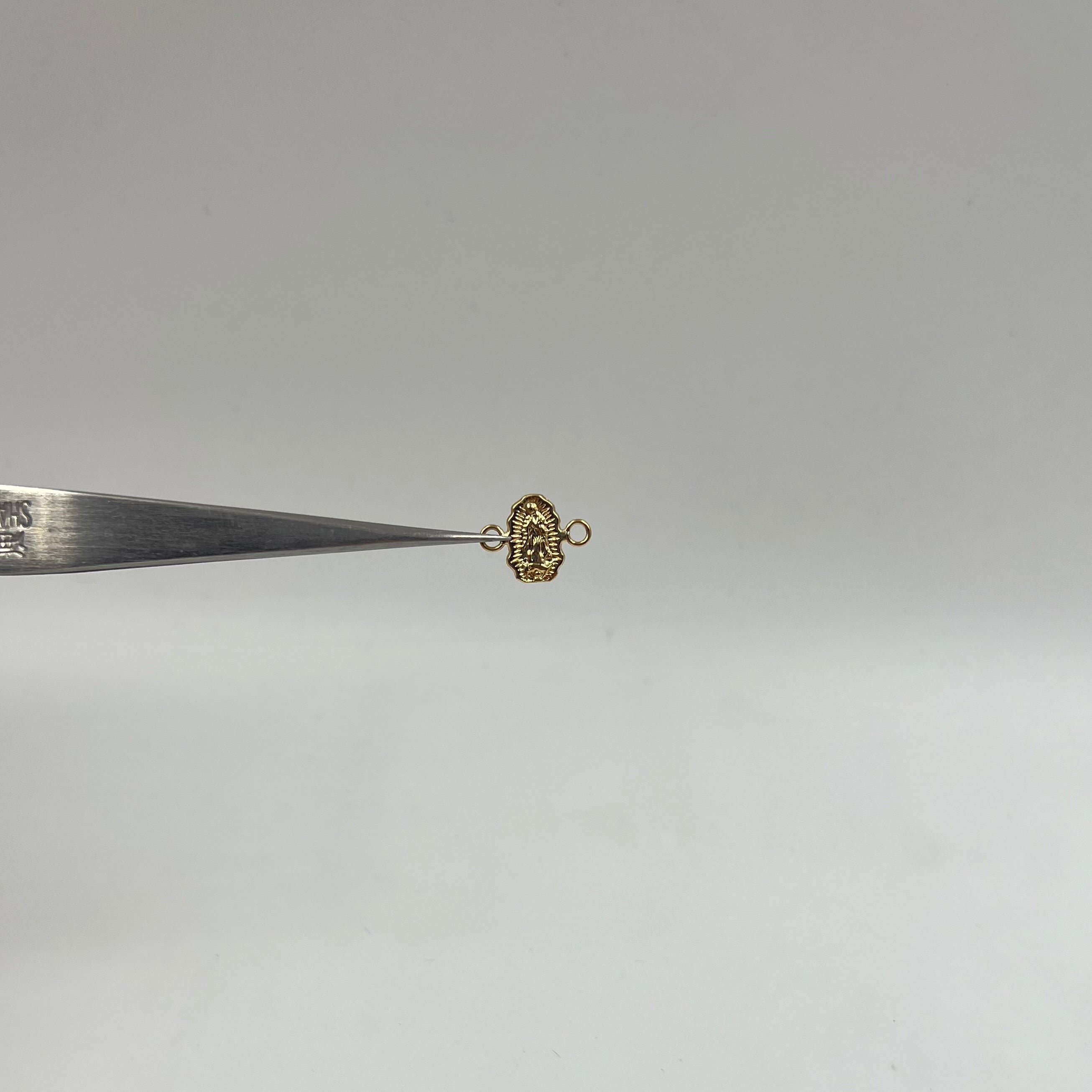 HERRAJE FIGURA GUADALUOE ORO AMARILLO 18K 0,36 GR / 1,3 CM