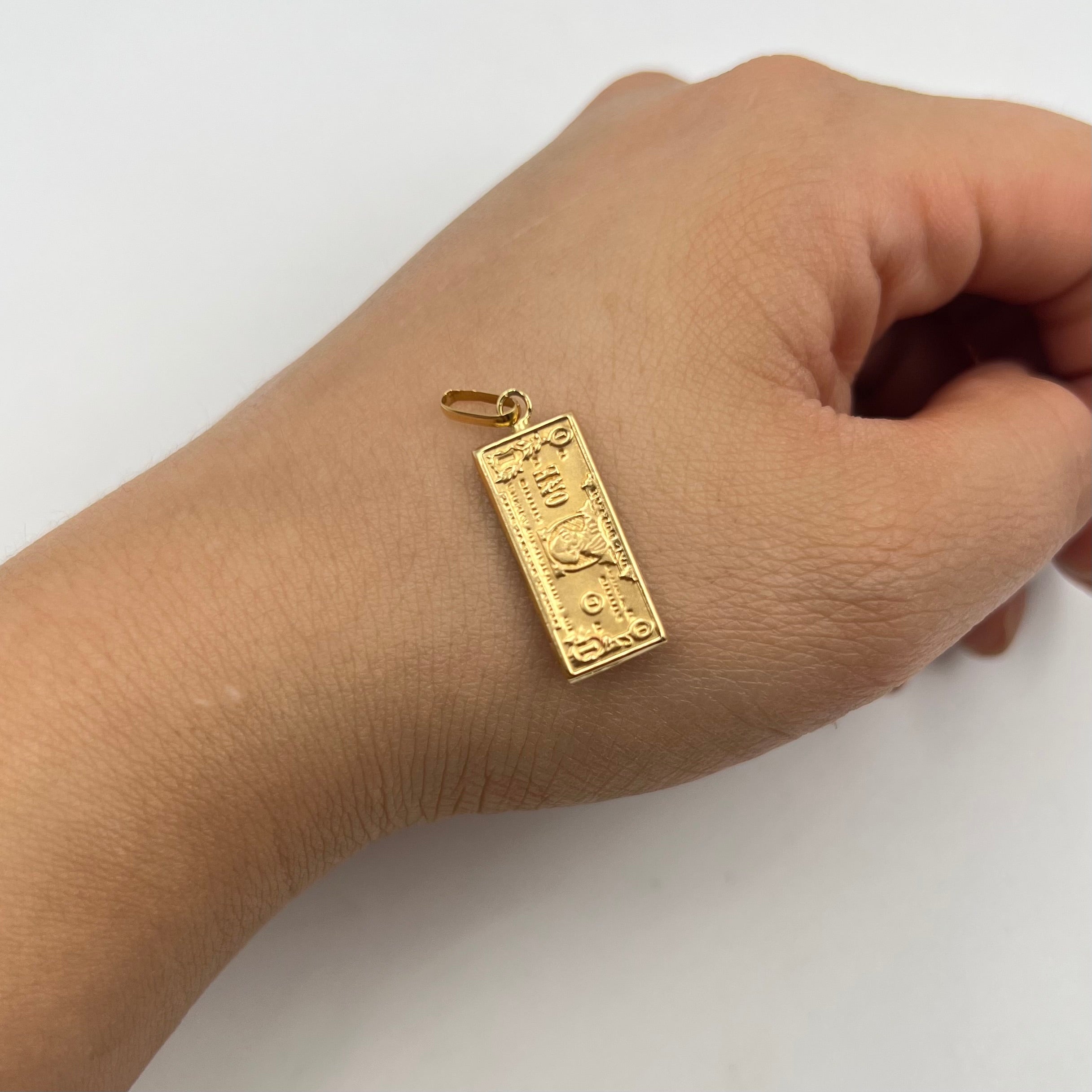 DIJE DOLAR  ORO AMARILLO 18K 1,1 GR / 9 MM / 2,4 CM