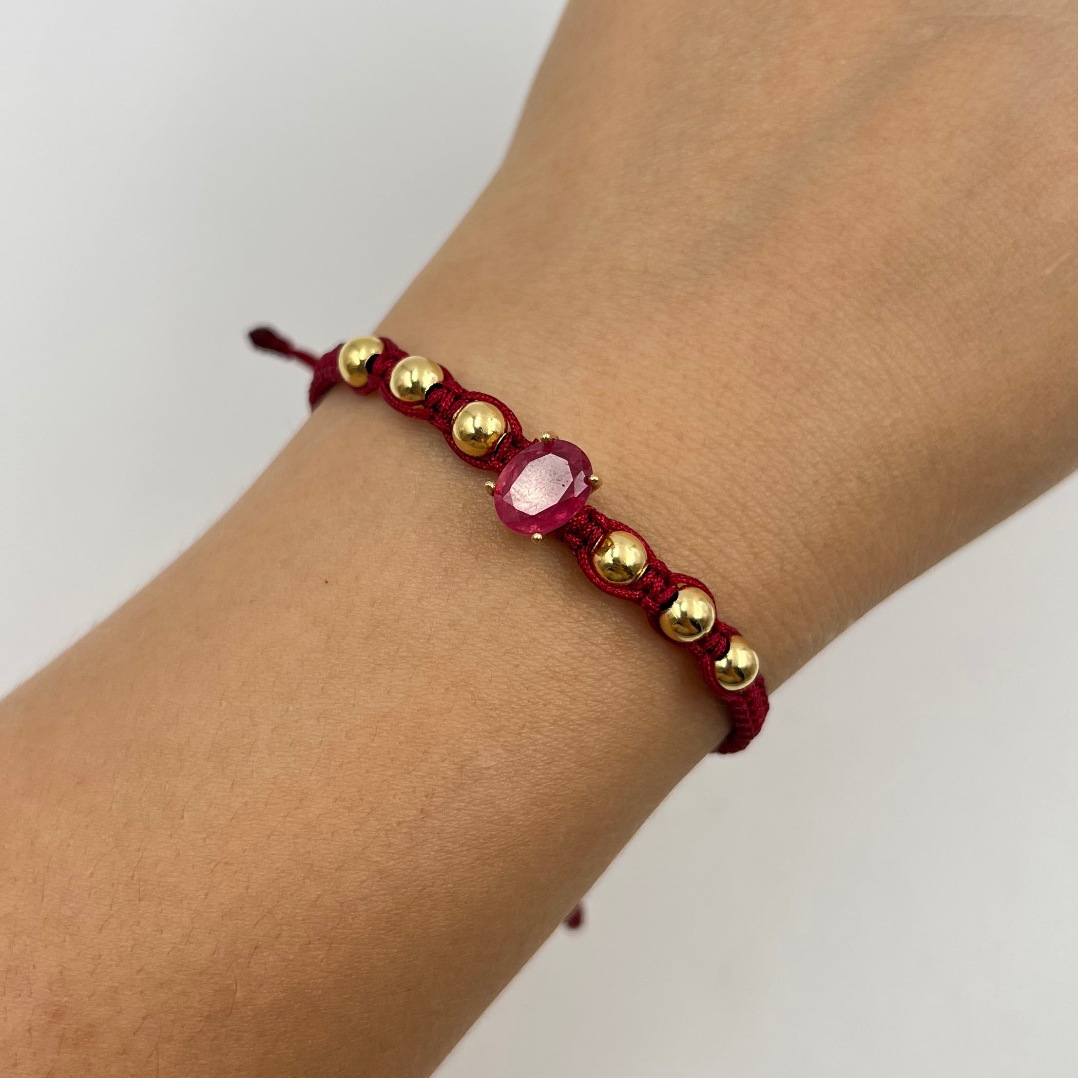 PULSERA TEJIDA VINOTINTO / HERRAJE RUBI 2,5 CT / BOLA LISA  5MM  / 1,98 GR (JOYA)