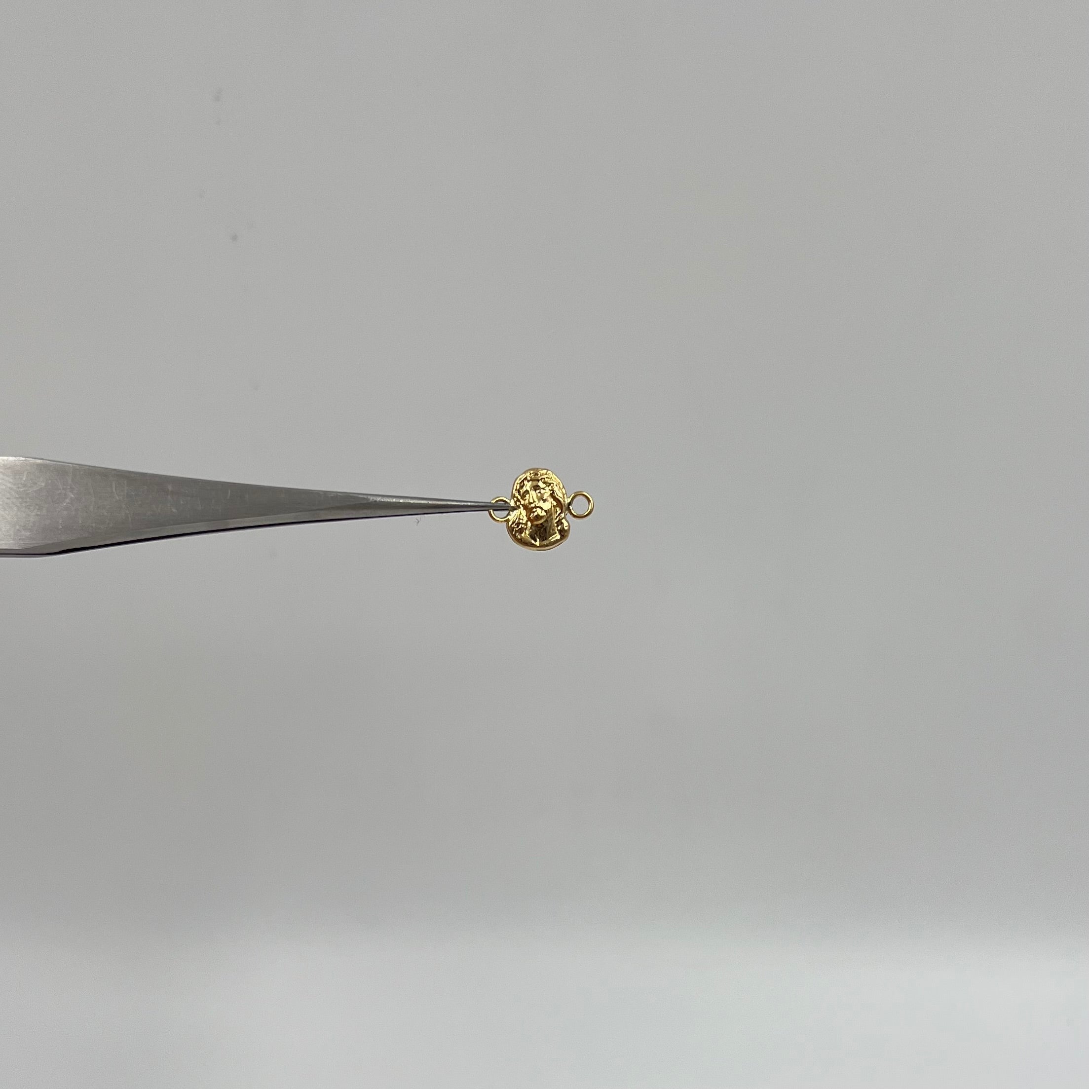HERRAJE ROSTRO DE JESUS  ORO AMARILLO 18K 0,3 GR / 1,1 CM