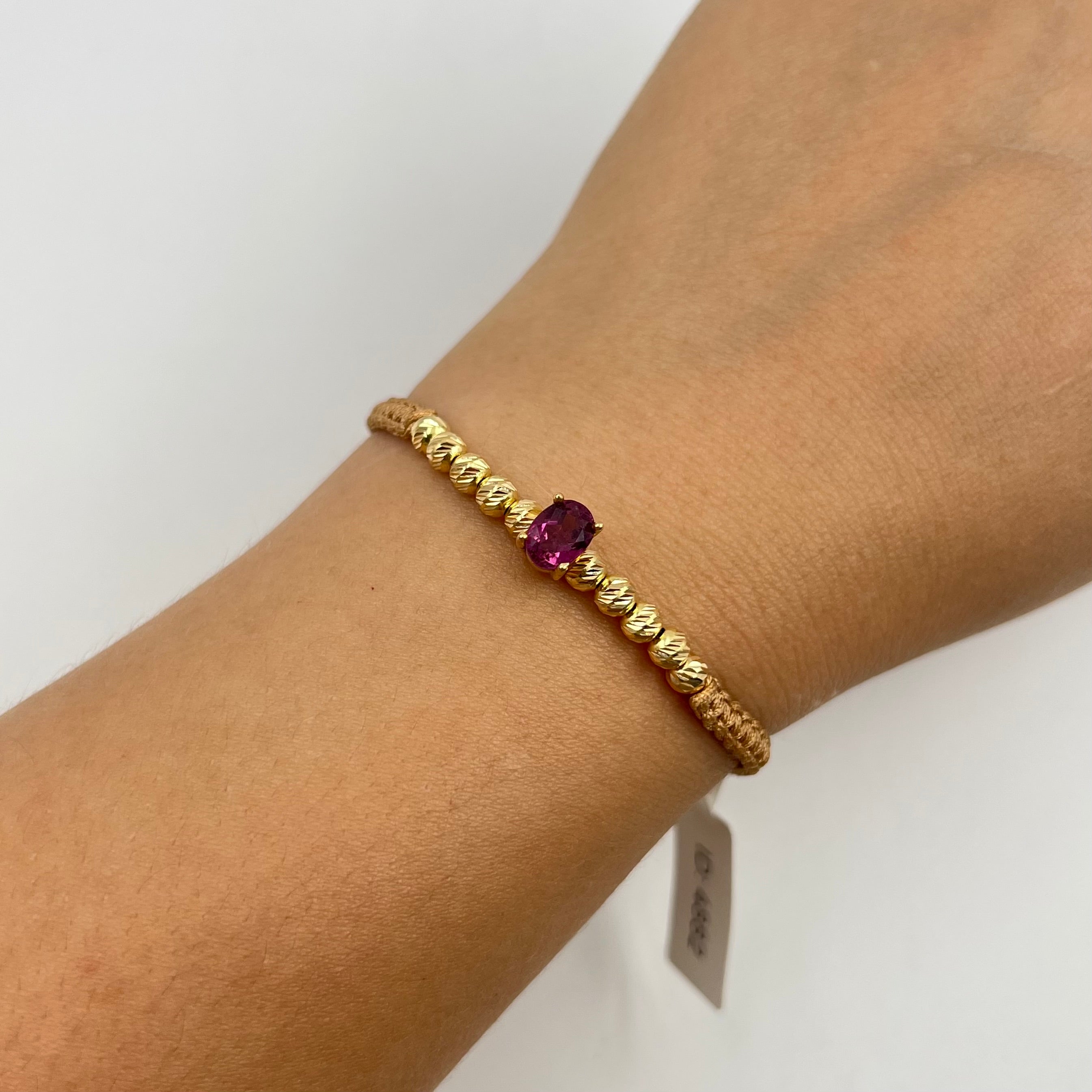 PULSERA TEJIDA DORADA / HERRAJE RUBI 1,5 CT/ BOLA DIAMANTADA 4MM / 1,46 GR (JOYA)