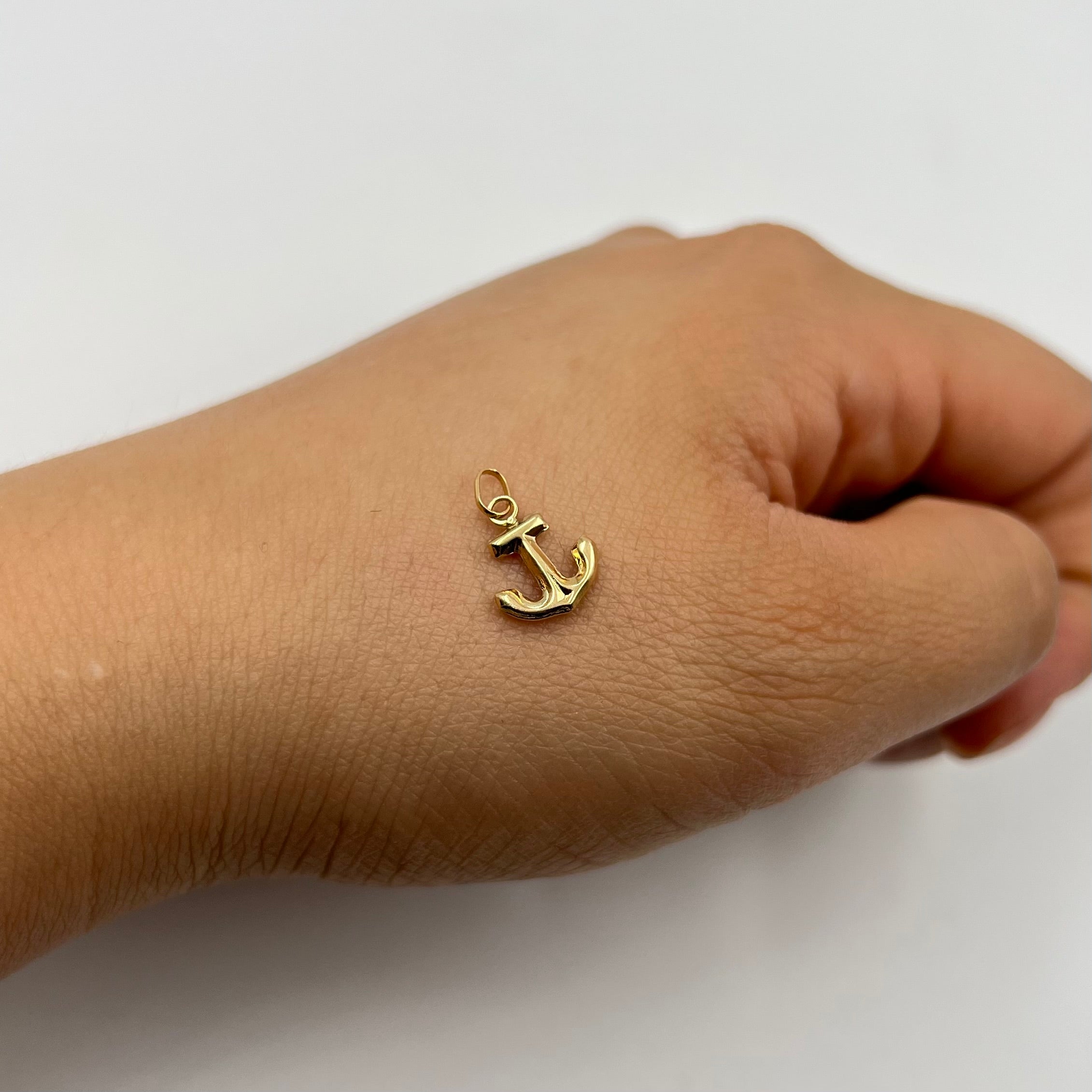 DIJE ANCLA  ORO AMARILLO 18K 0,28 GR / 9 MM / 1,1 CM