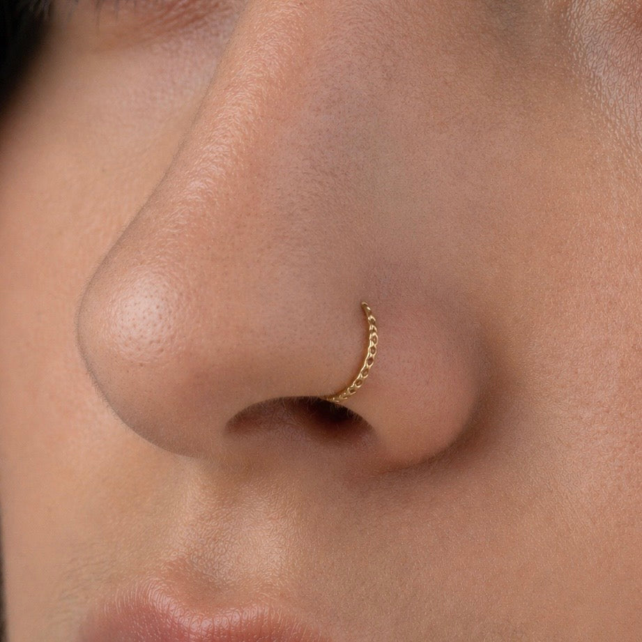 PIERCING ARGOLLA ENTORCHADO 0.25 GRAMOS 9MM